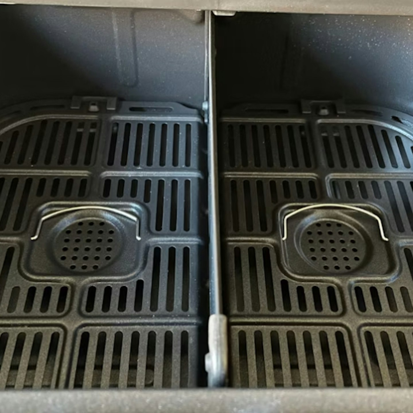 inside two compartments split with wall on Instant Vortex Plus VersaZone Air Fryer