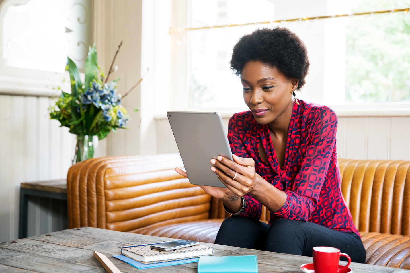 woman using android tablet