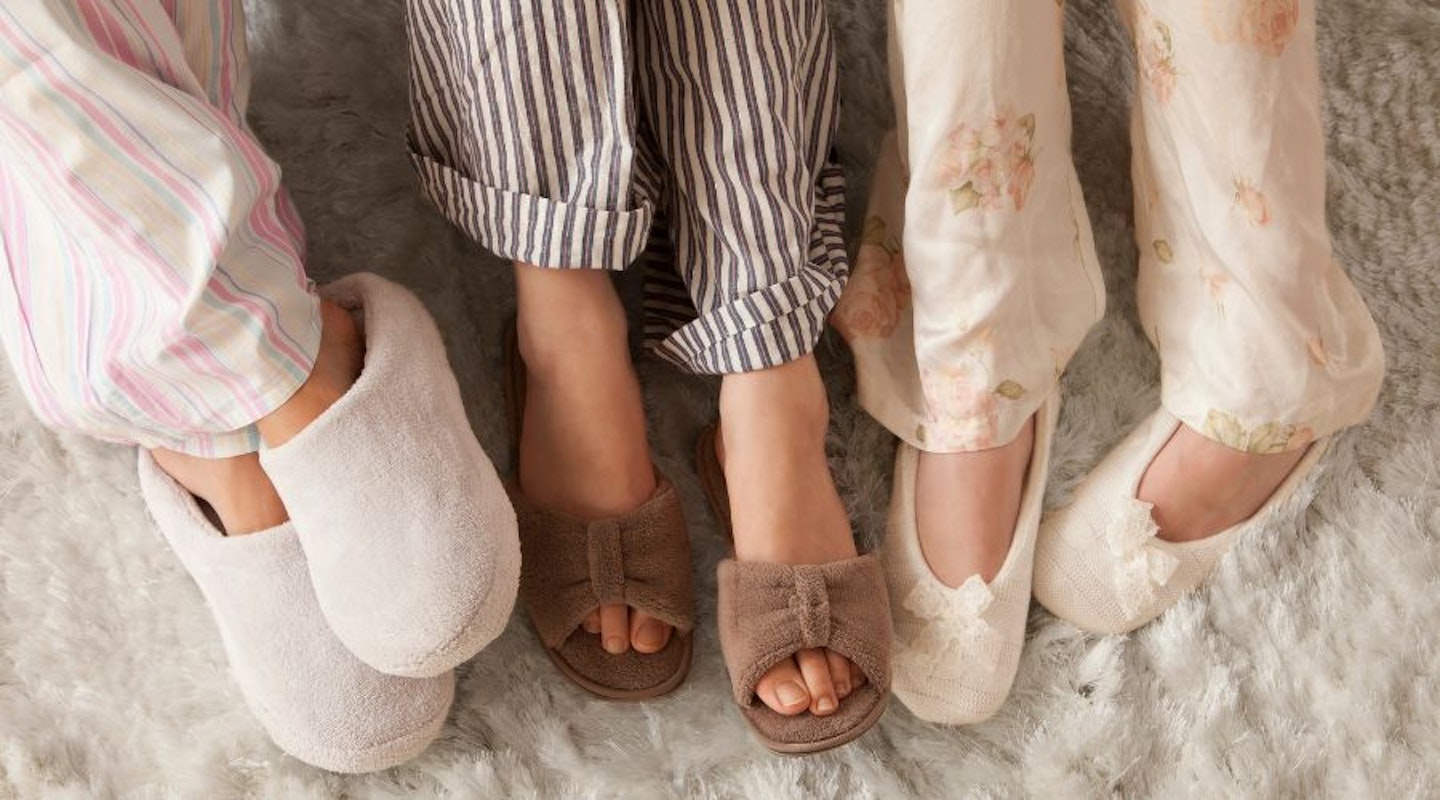 A close up of different styles of the best women's slippers