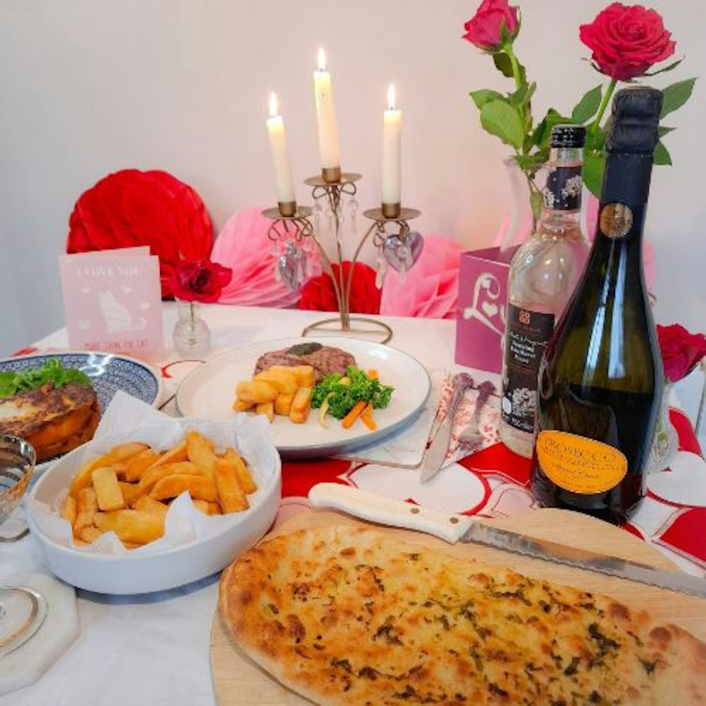 a romantic tablescape with Co-Op Valentine's meal deal cooked and served