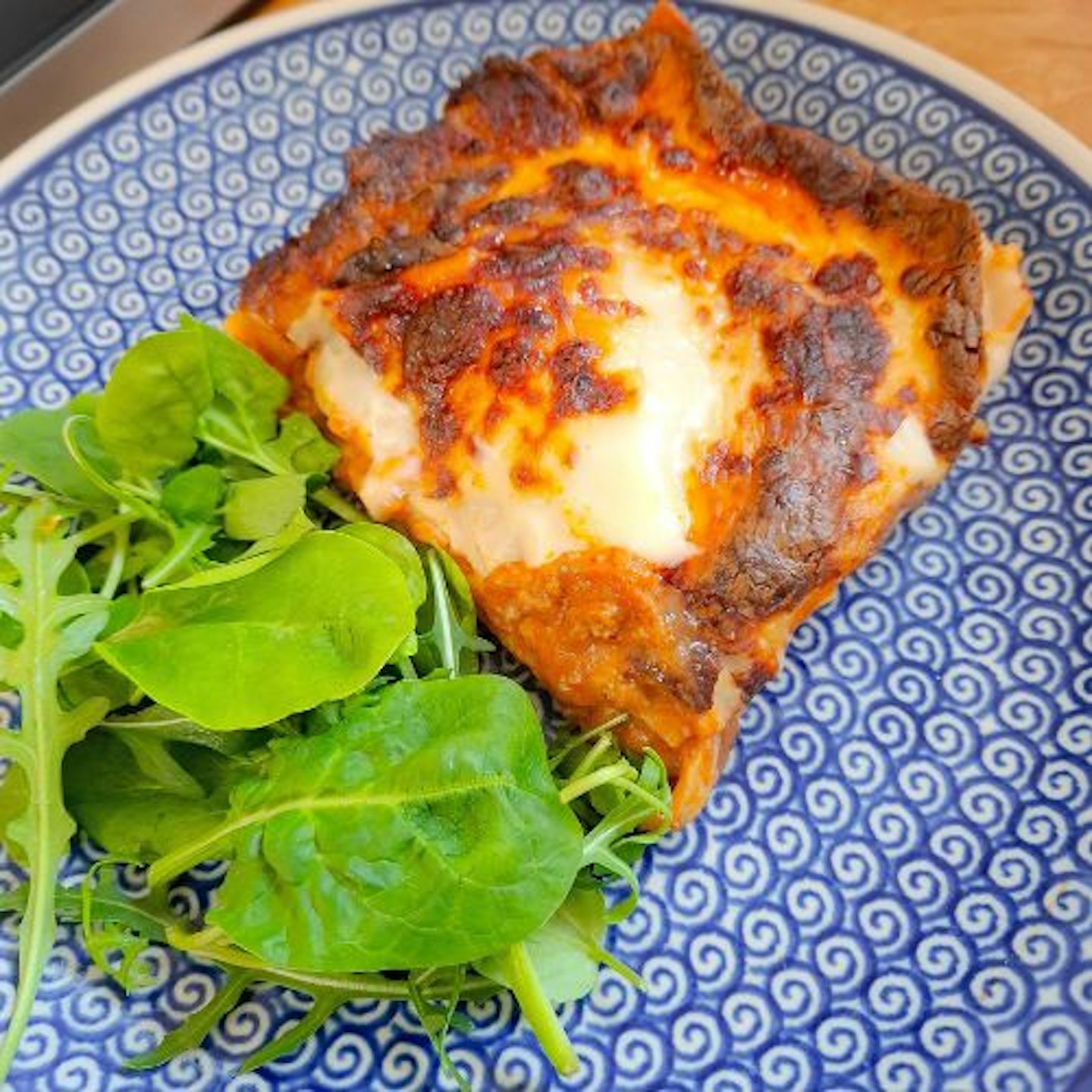 close up of plates with Co-Op Valentine's meal deal lasagne and salad