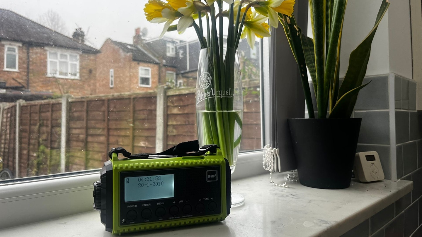 Portable DAB/FM Radio with Rechargeable Battery on a windowsill