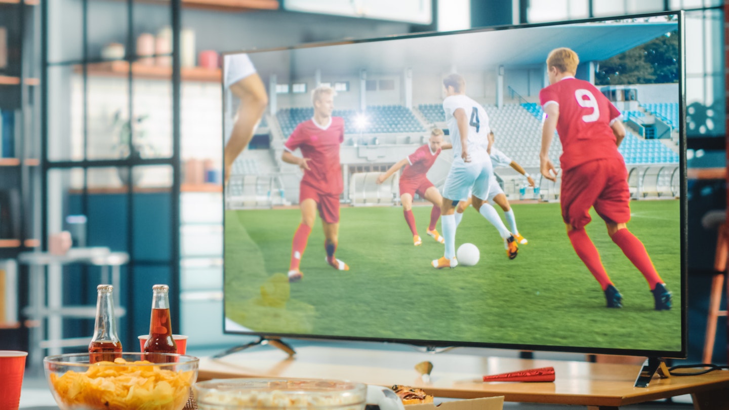 The best 32-inch TV's - TV in lounge with football on screen