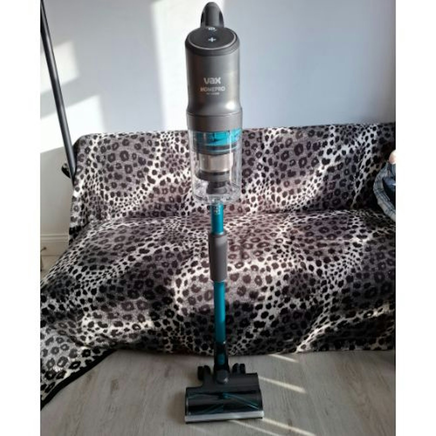 Self standing VAX HomePro Pet Design Cordless Vacuum Cleaner on a hard floor