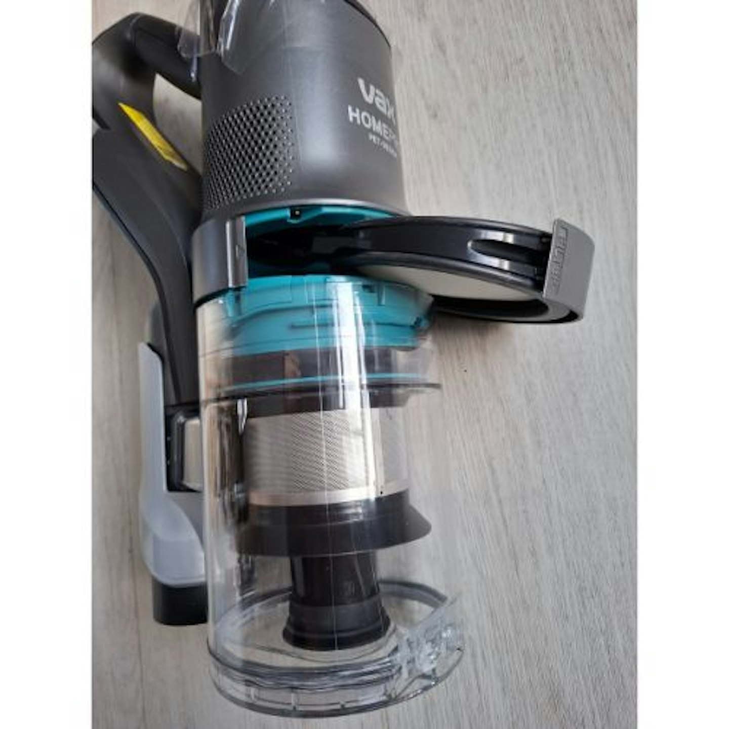 Partially removed filter pad to show how it slots into the VAX HomePro Pet Design Cordless Vacuum Cleaner