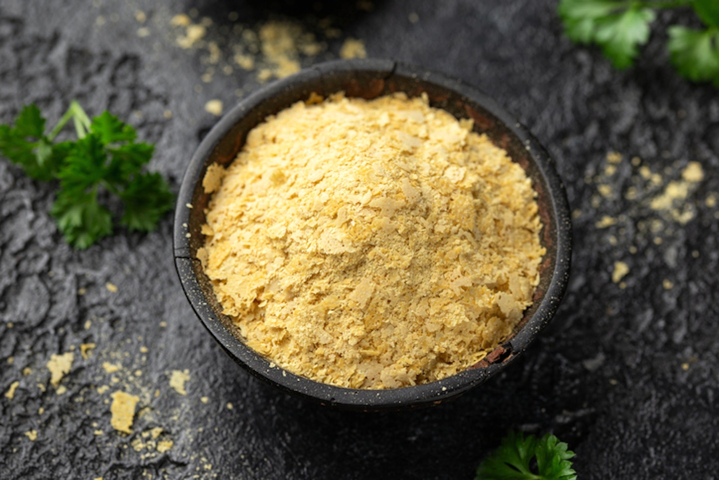 Dried nutritional yeast flakes, vegan vegetarian seasoning healthy food supplement