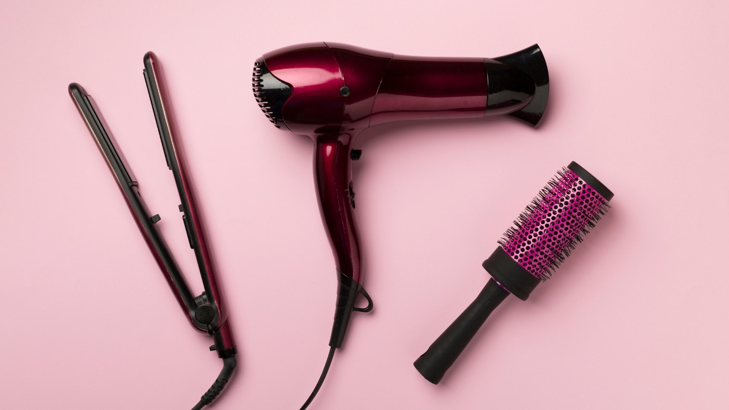 hair tools on pink background