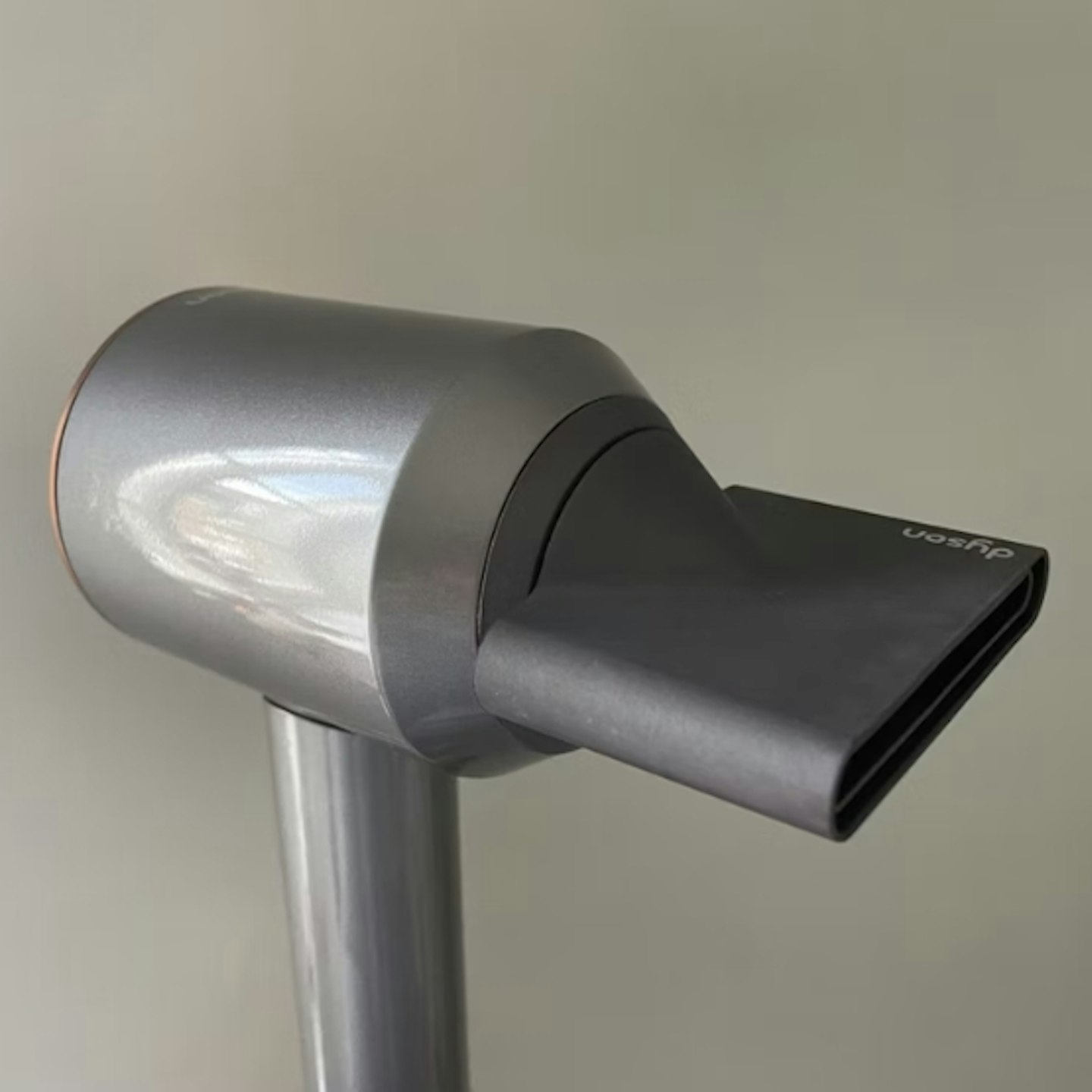 styling concentrator on the Dyson Supersonic™ Hair Dryer Nickel/Copper