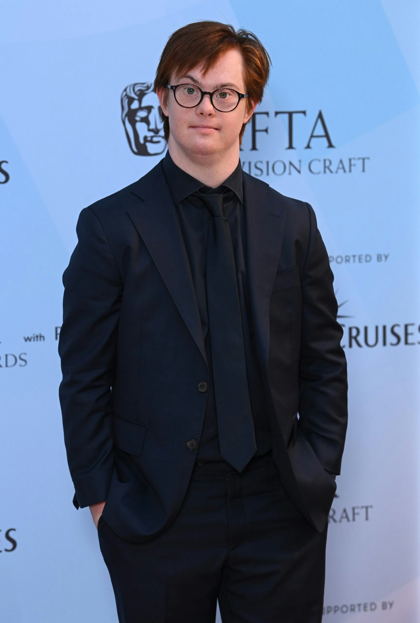 Daniel Laurie photographed in a black tuxedo at the BAFTA Television and Television Craft Awards Nominees' Party