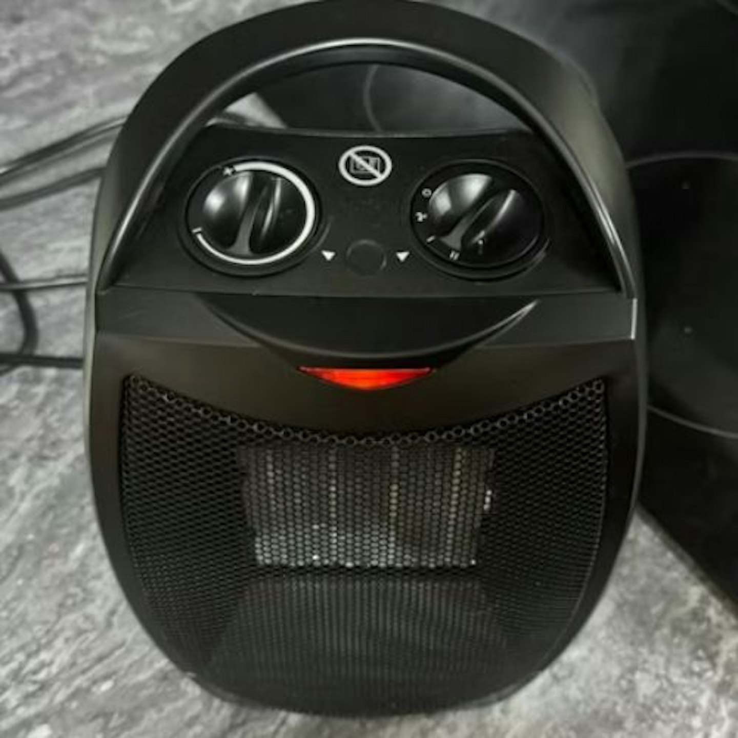 Russell Hobbs 1500W Portable Ceramic Heater top view showing dial controls