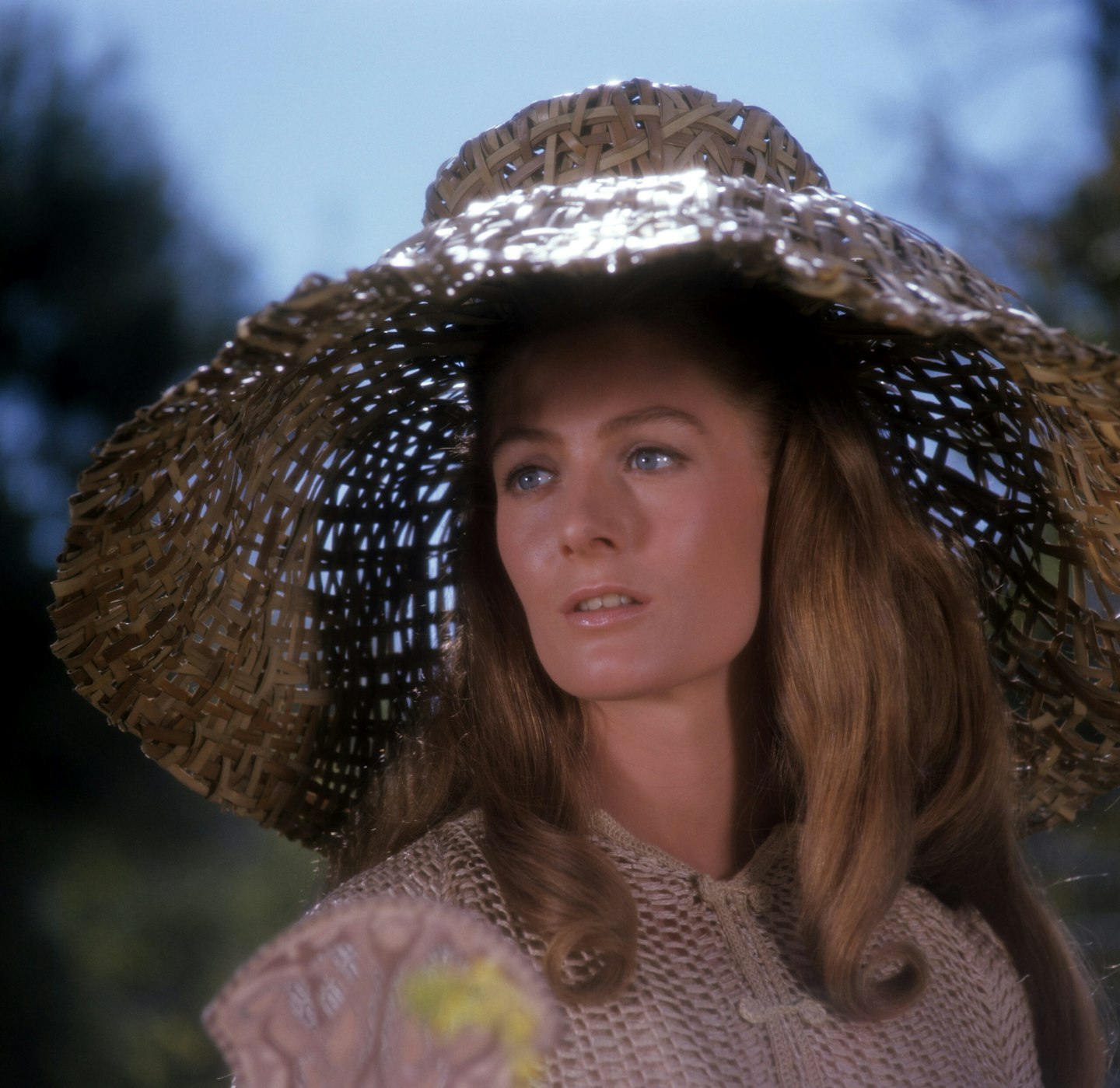 Vanessa Redgrave wearing a straw hat in Camelot