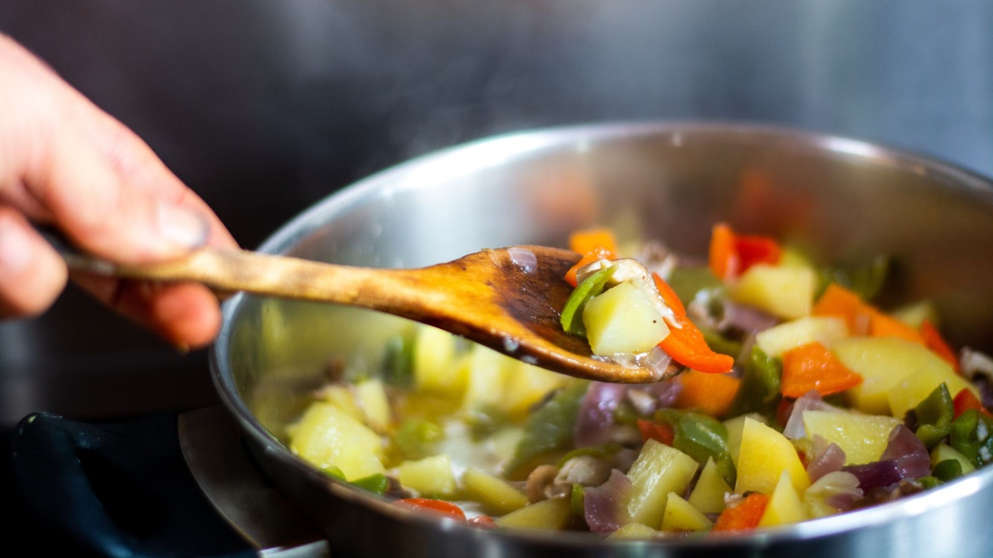 Pot with vegetable stew, cooking