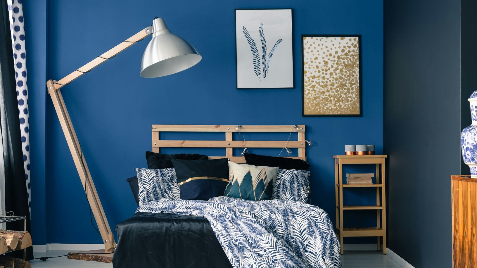 Navy bedroom ideas: Add printed artwork to your wall