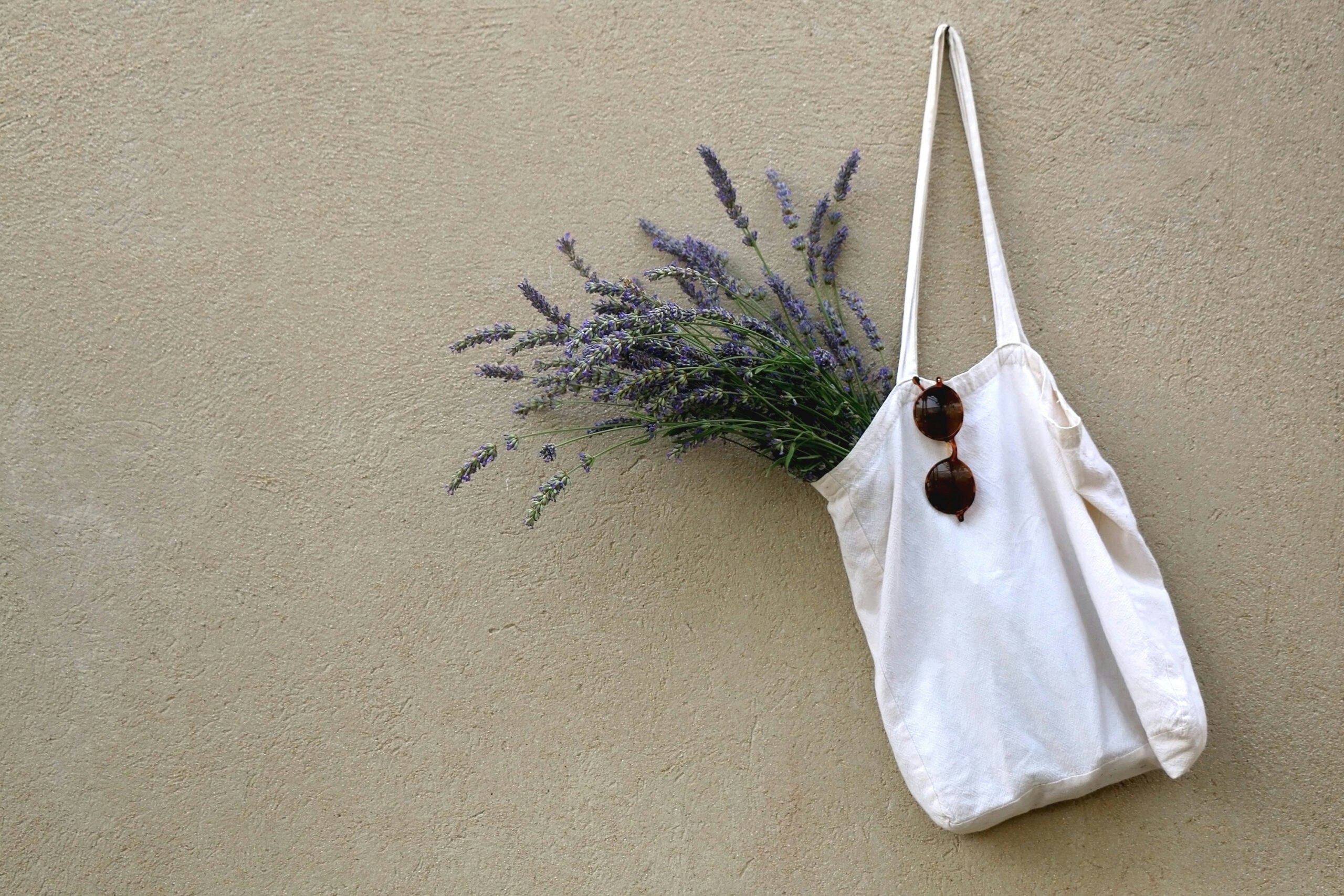tote bag with flowers hanging on a wall