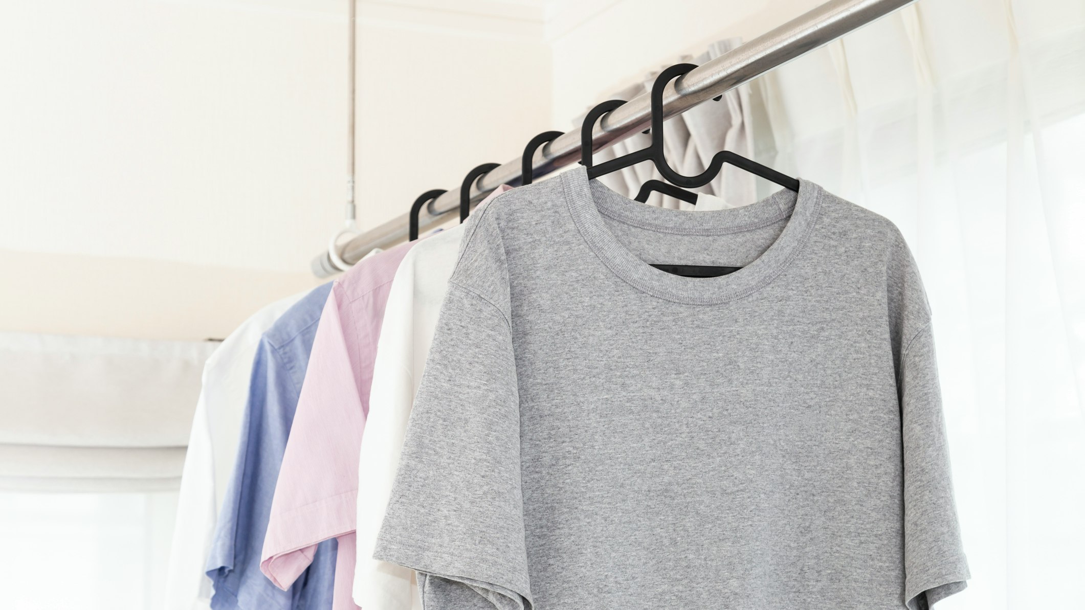 hanging clothes rail with grey t-shirt on