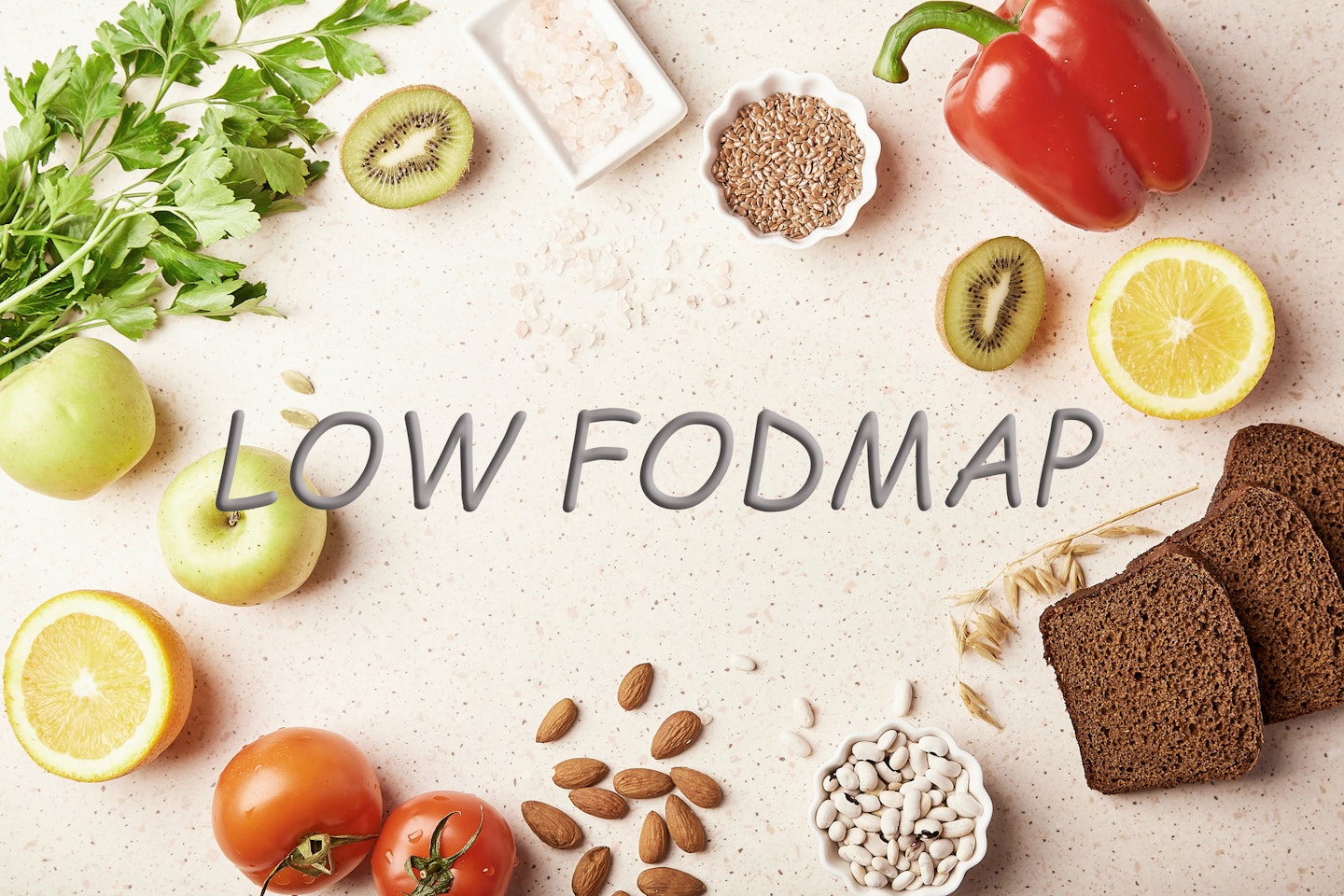 Low FODMAP concept with with fruits,vegetables, greens, nuts, beans, flax seeds, chia seeds, wholegrain bread.