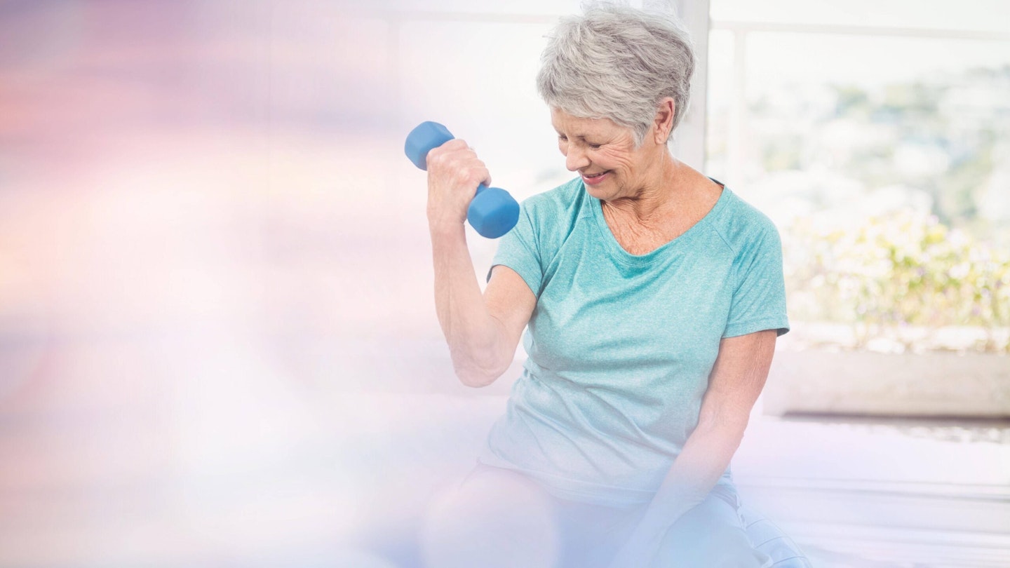 Lady doing a dumbbell bicep curl