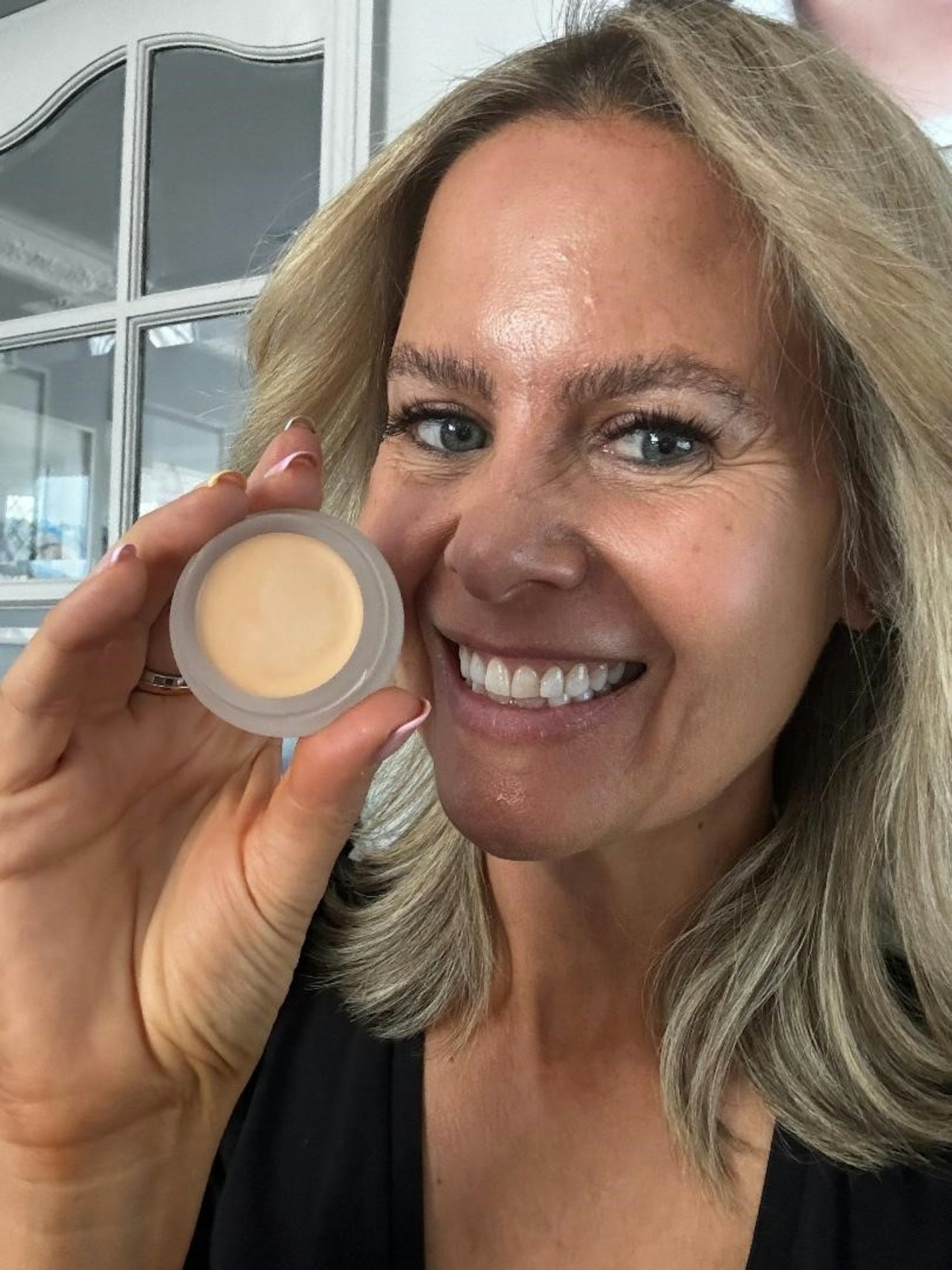 Product tester with Rms Beauty UnCoverup Concealer