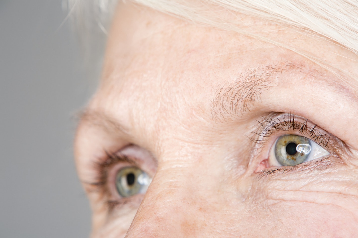 hooded eyes of an older woman