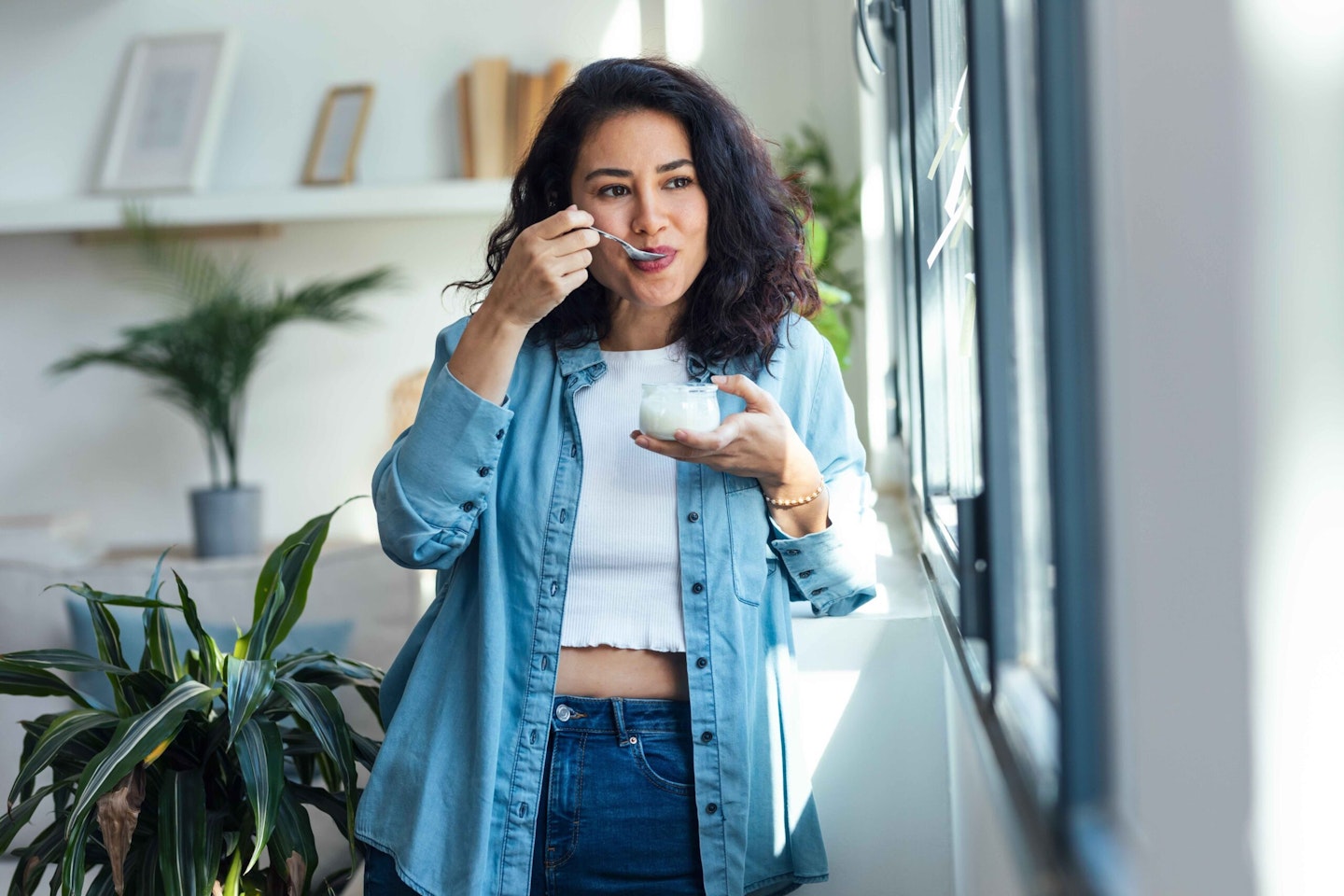 Woman eating yoghurt