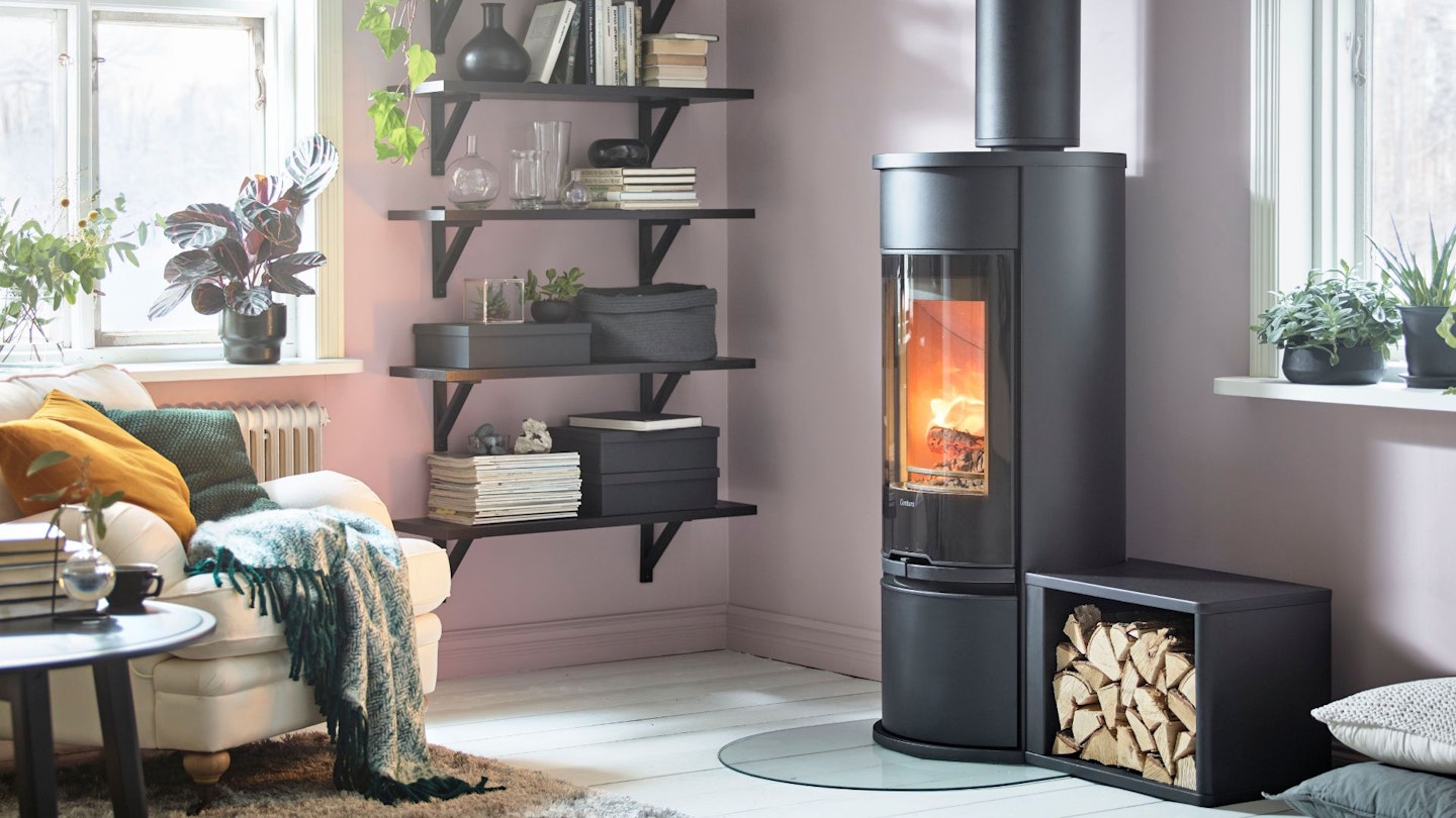 Contura C610G Style black chimney wood burner in a stylish contemporary home