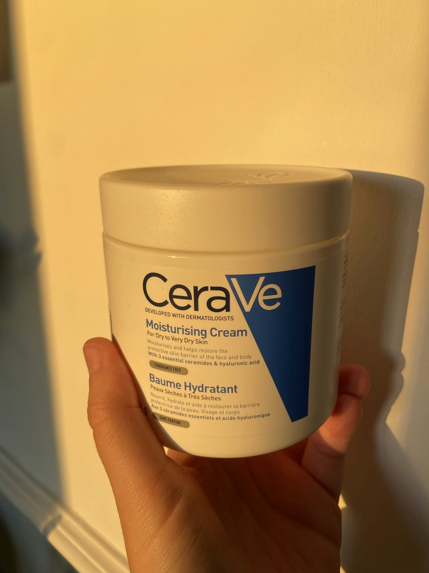 Image of our tester holding the Cera Ve Moisturising Cream