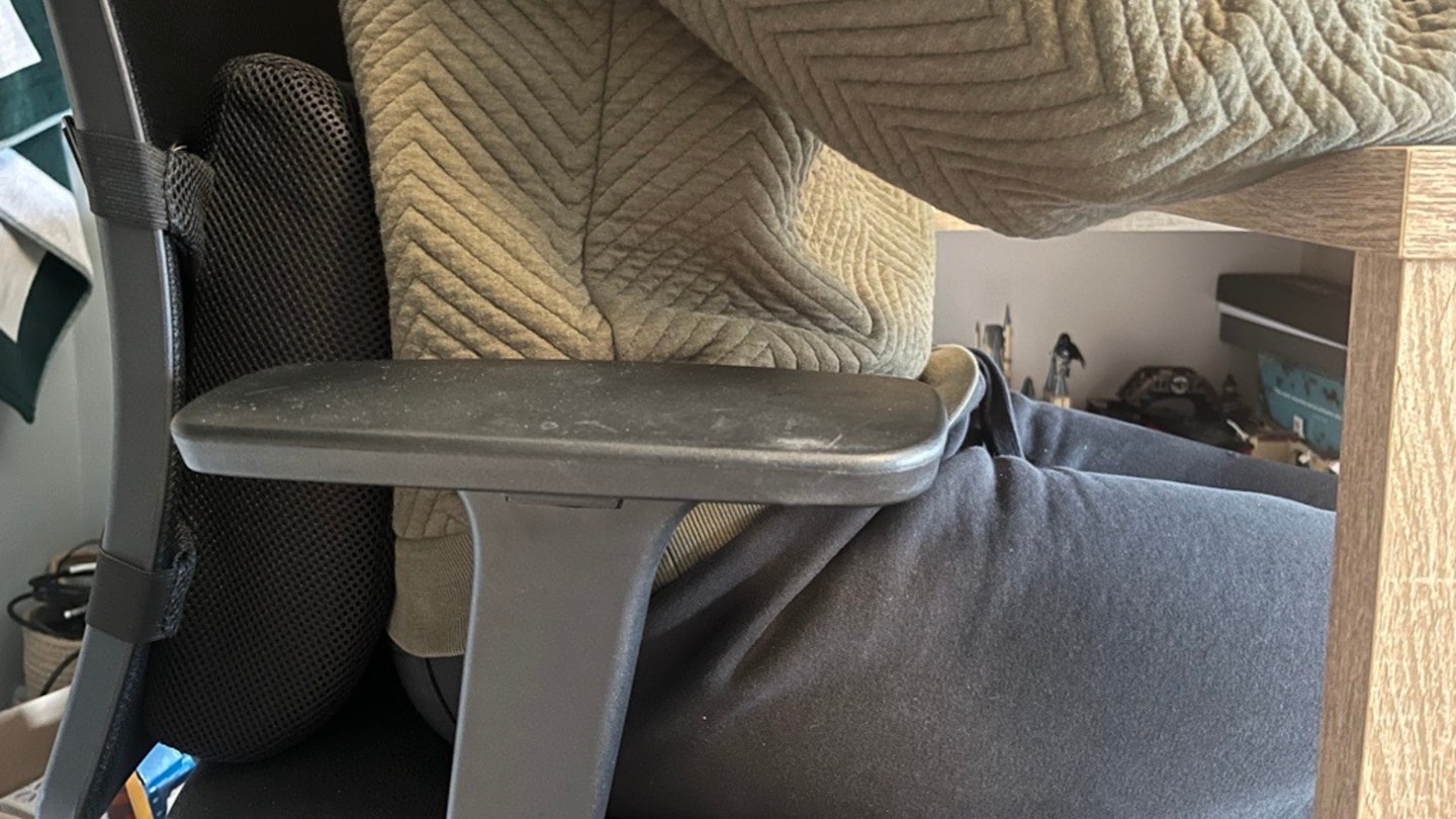 woman using the Everlasting Comfort Memory Foam Lumbar Support Cushion on desk chair