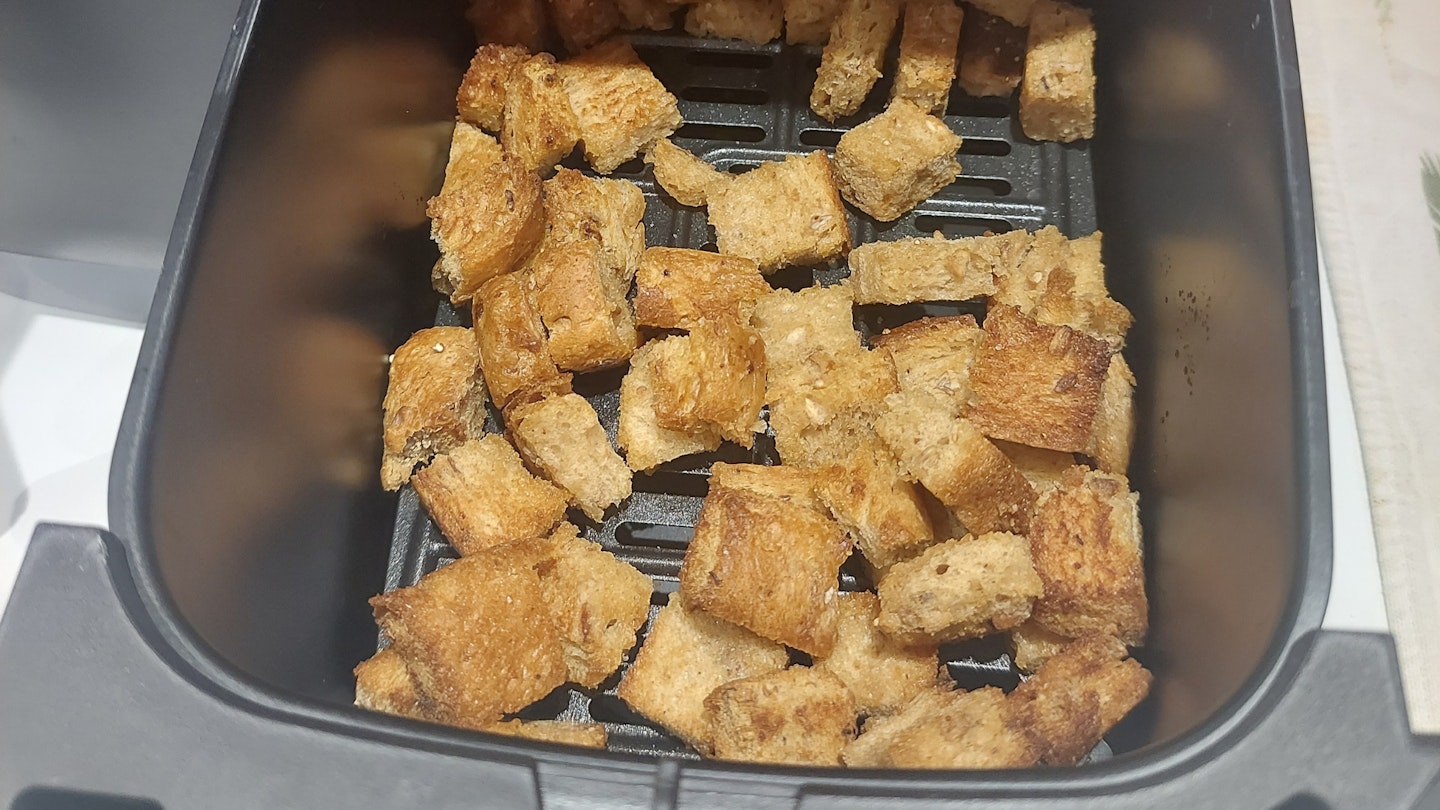 food being cooked in the Ultenic K20 Dual Basket Air Fryer