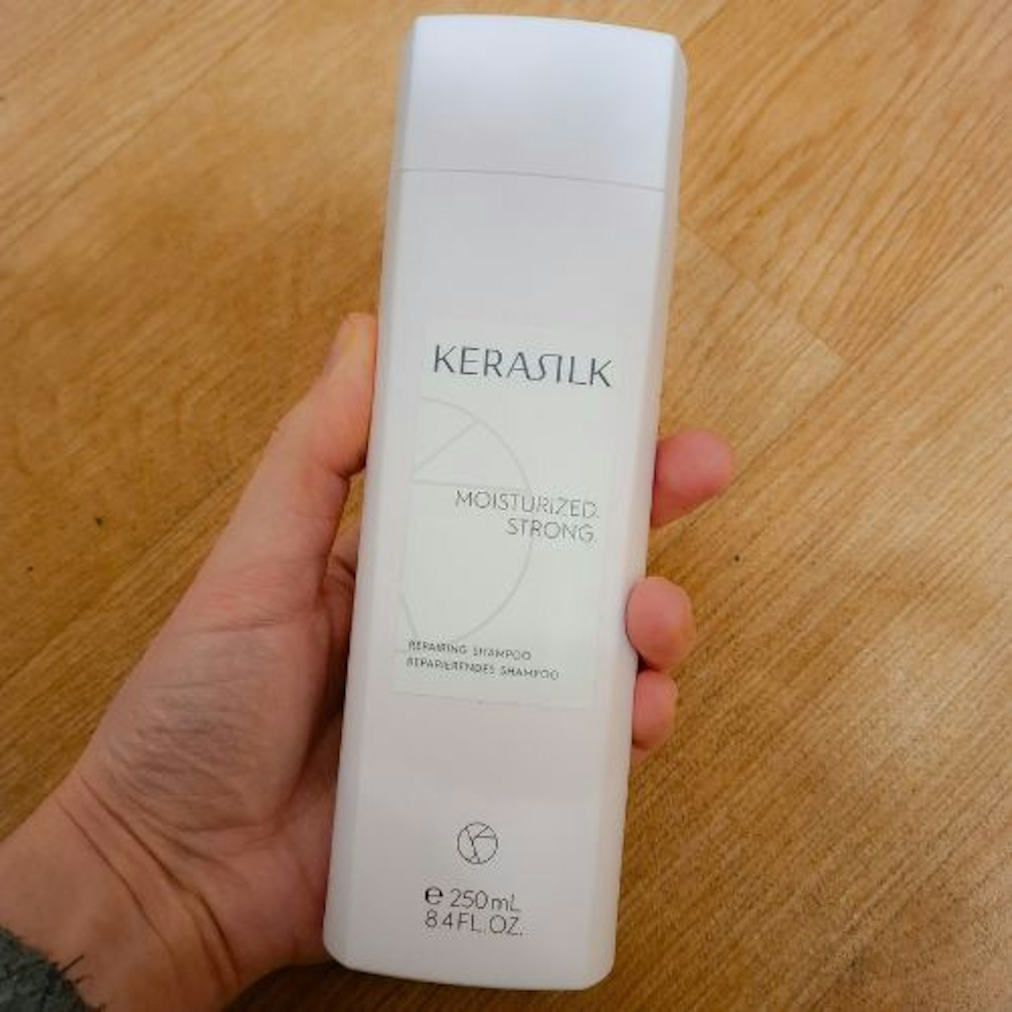 Kerasilk Repairing Shampoo front of bottle