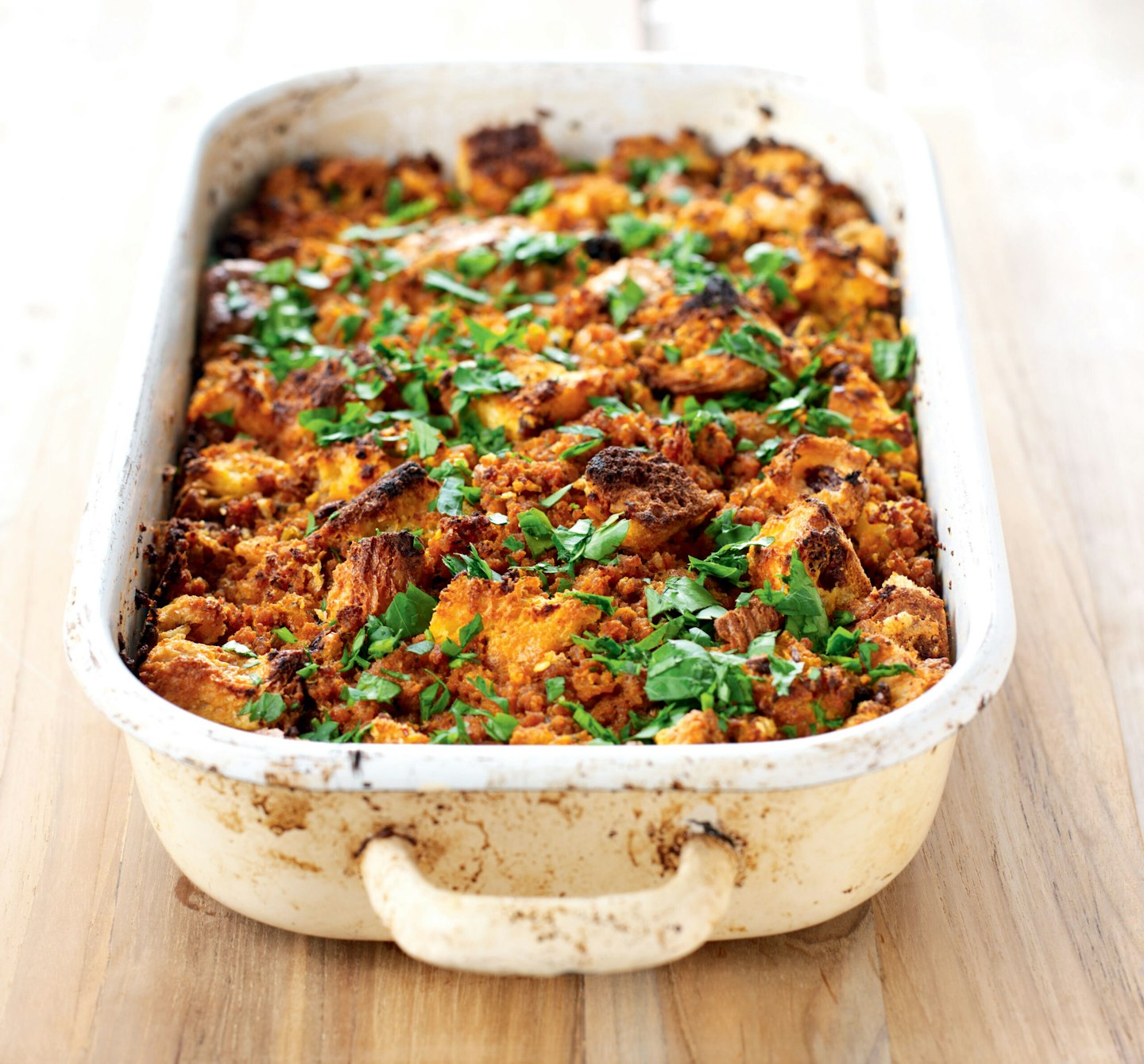 Nigella Lawson’s Panettone and Italian Sausage Stuffing served in a white tray