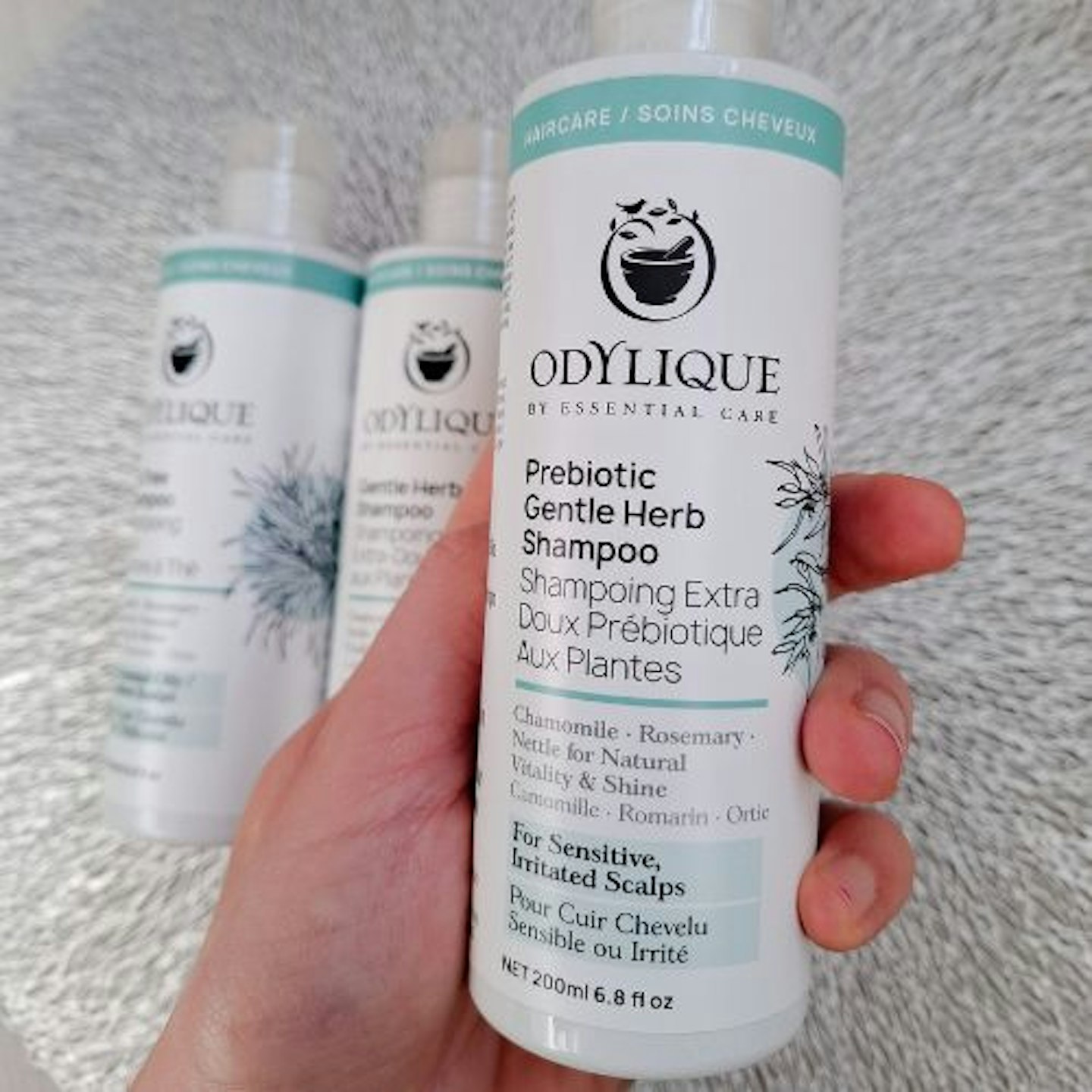 Odylique Prebiotic Gentle Herb Shampoo close up of bottle