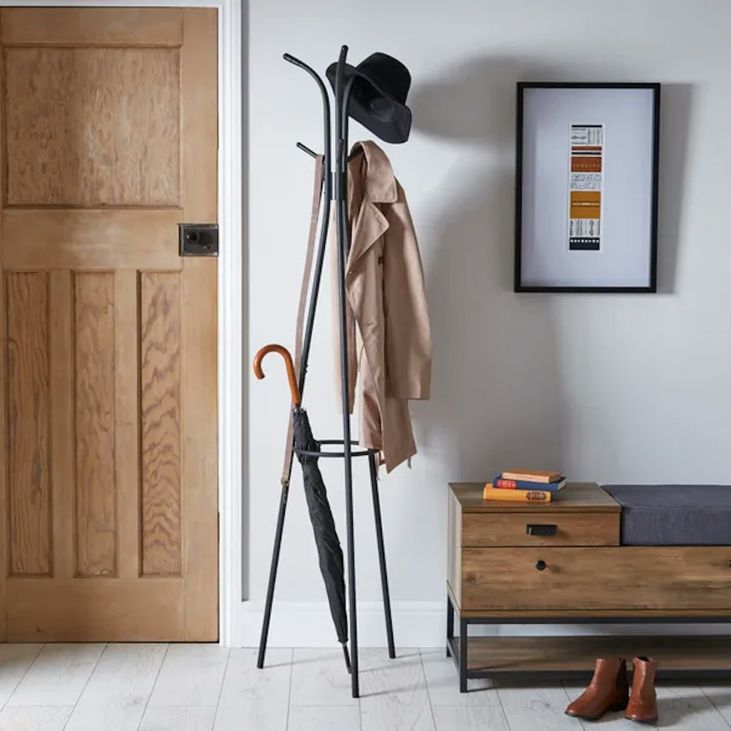 Image of the Metal Black Coat Stand with coats and hat