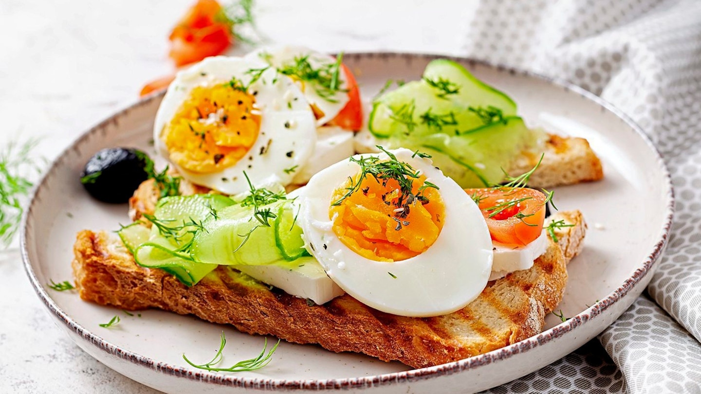 Healthy breakfast. Toast with feta cheese and egg