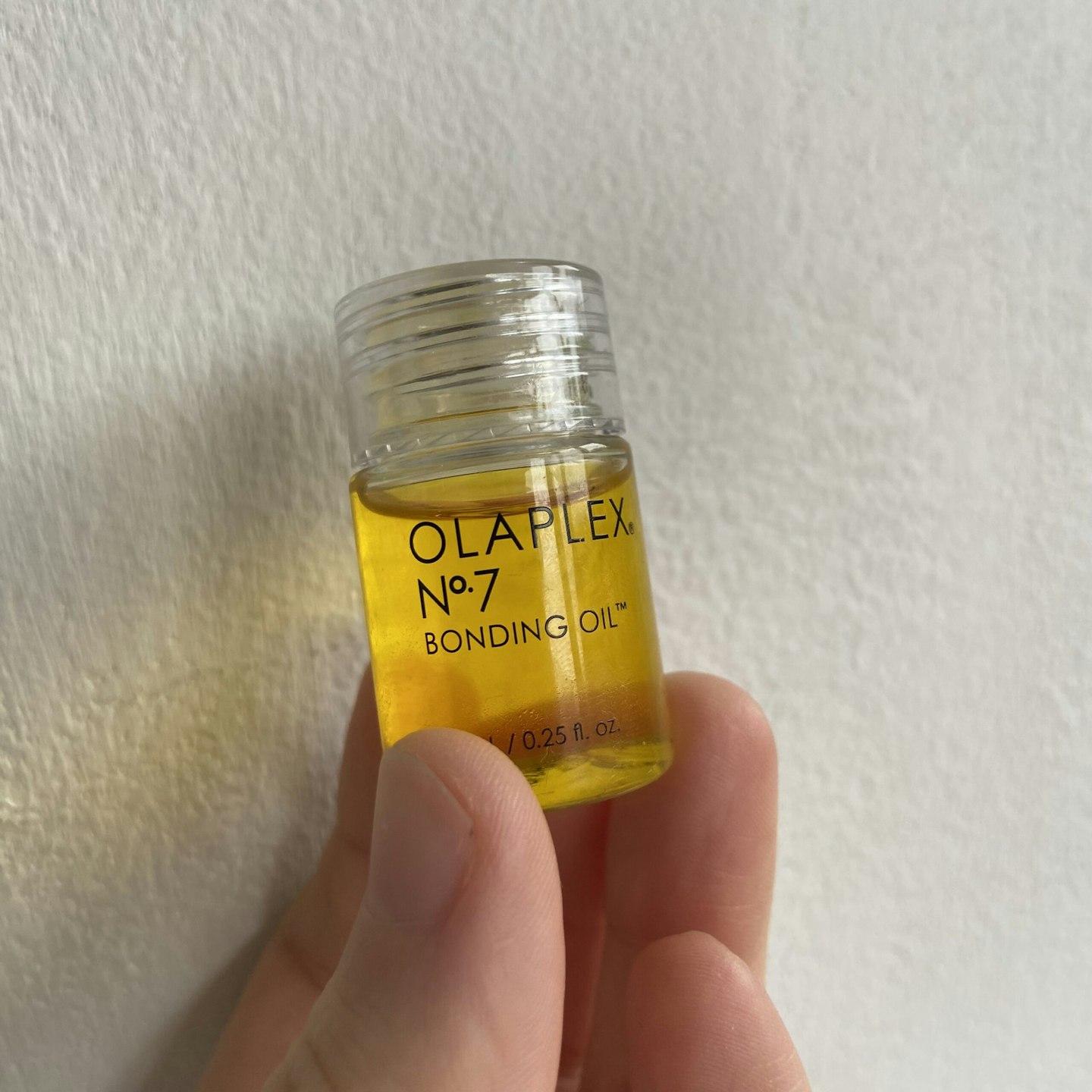 Ella holding the Olaplex No.7 Oil