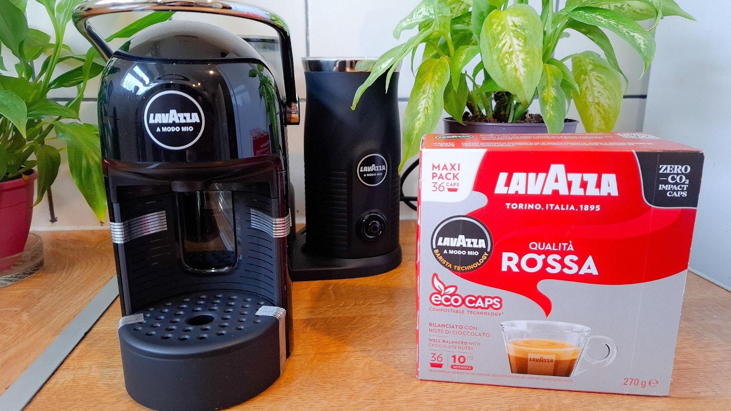 Lavazza A Modo Mio Jolie & Milk coffee machine in a domestic kitchen with a box of eco cap Lavazza coffee capsules