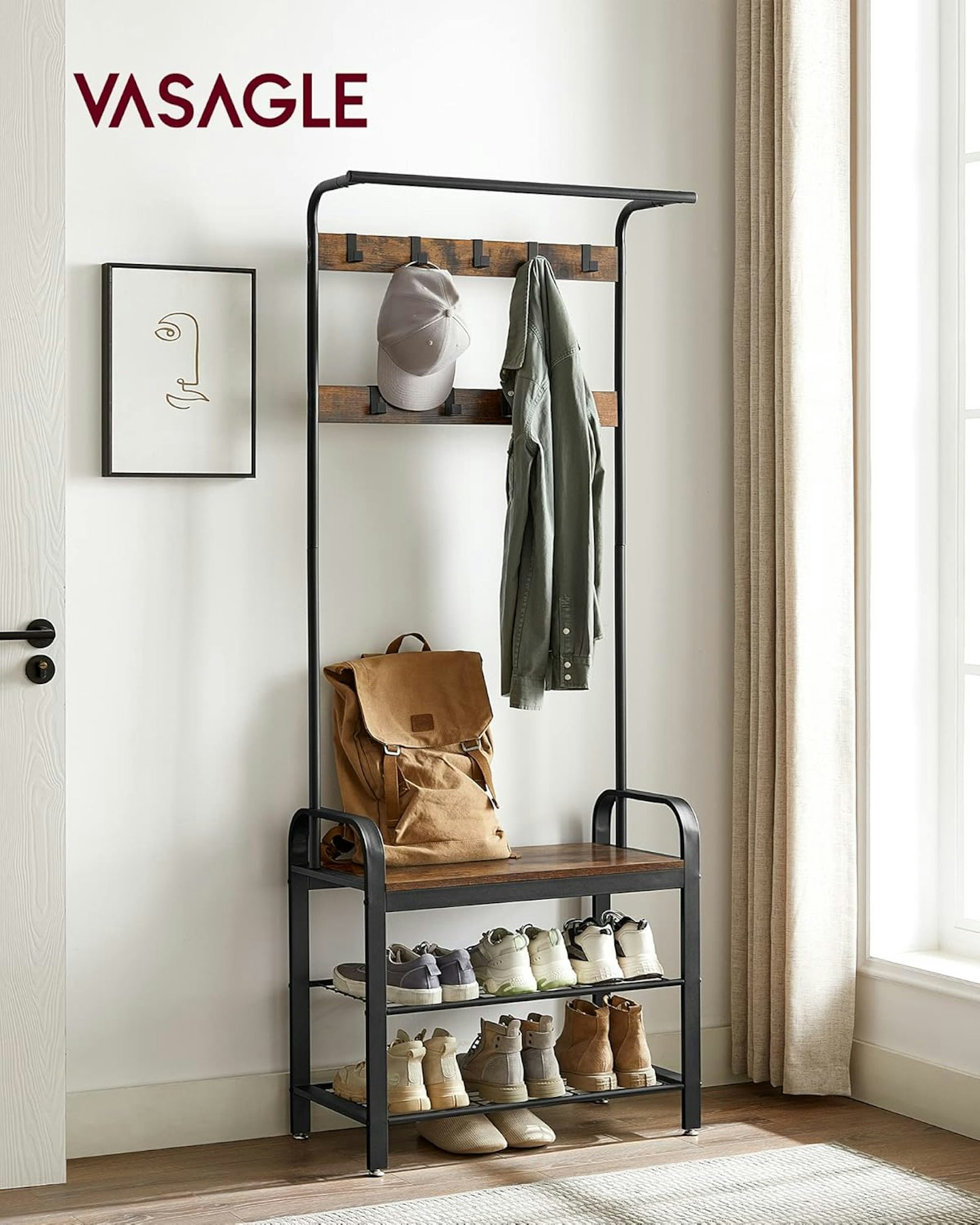 Image of the VASAGLE Coat Rack with coats and shoes on it 