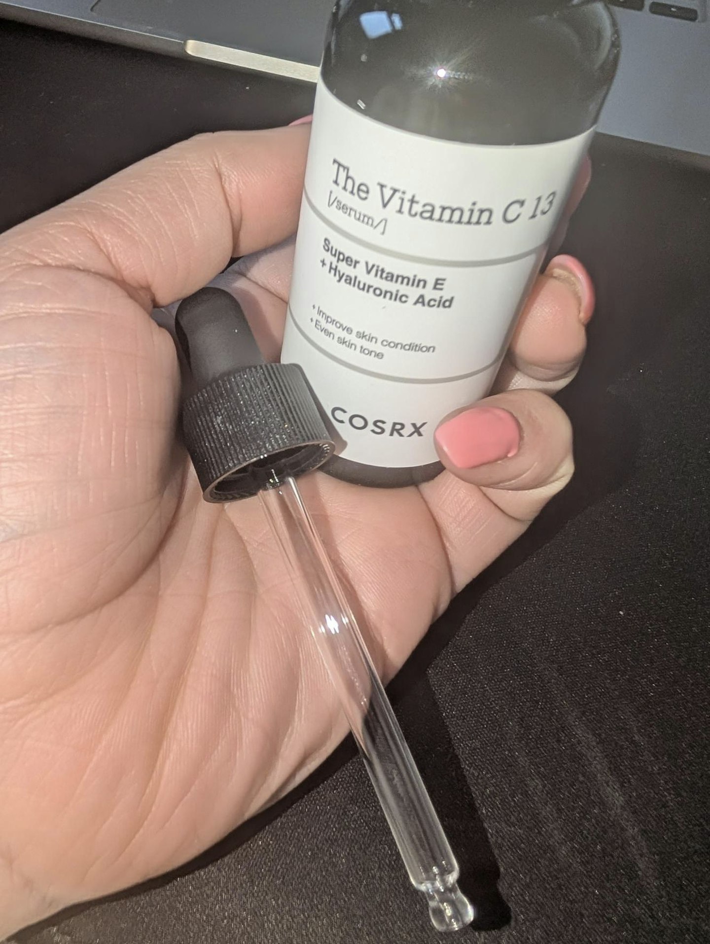 Tester holding the COSRX Pure Vitamin C 23% Serum