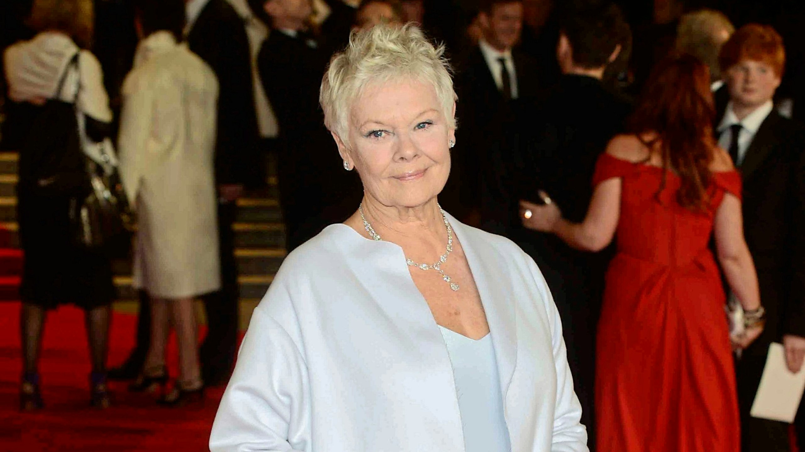 Judi, unaided, on the red carpet