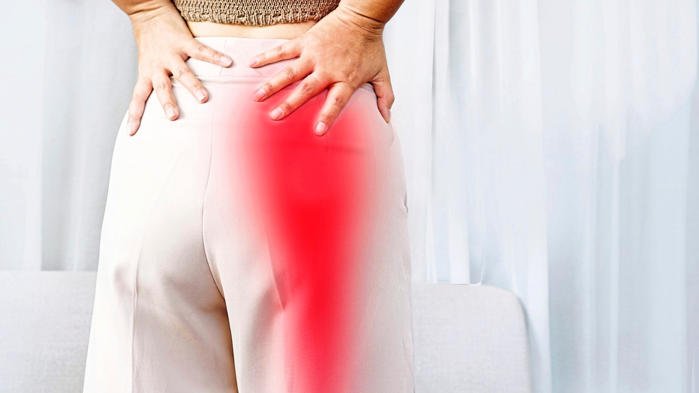 Red glowing area on a woman to show suffering from pain going down leg