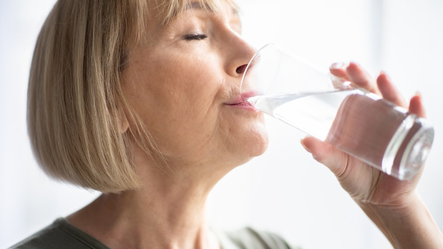 Woman drinking a glass of water