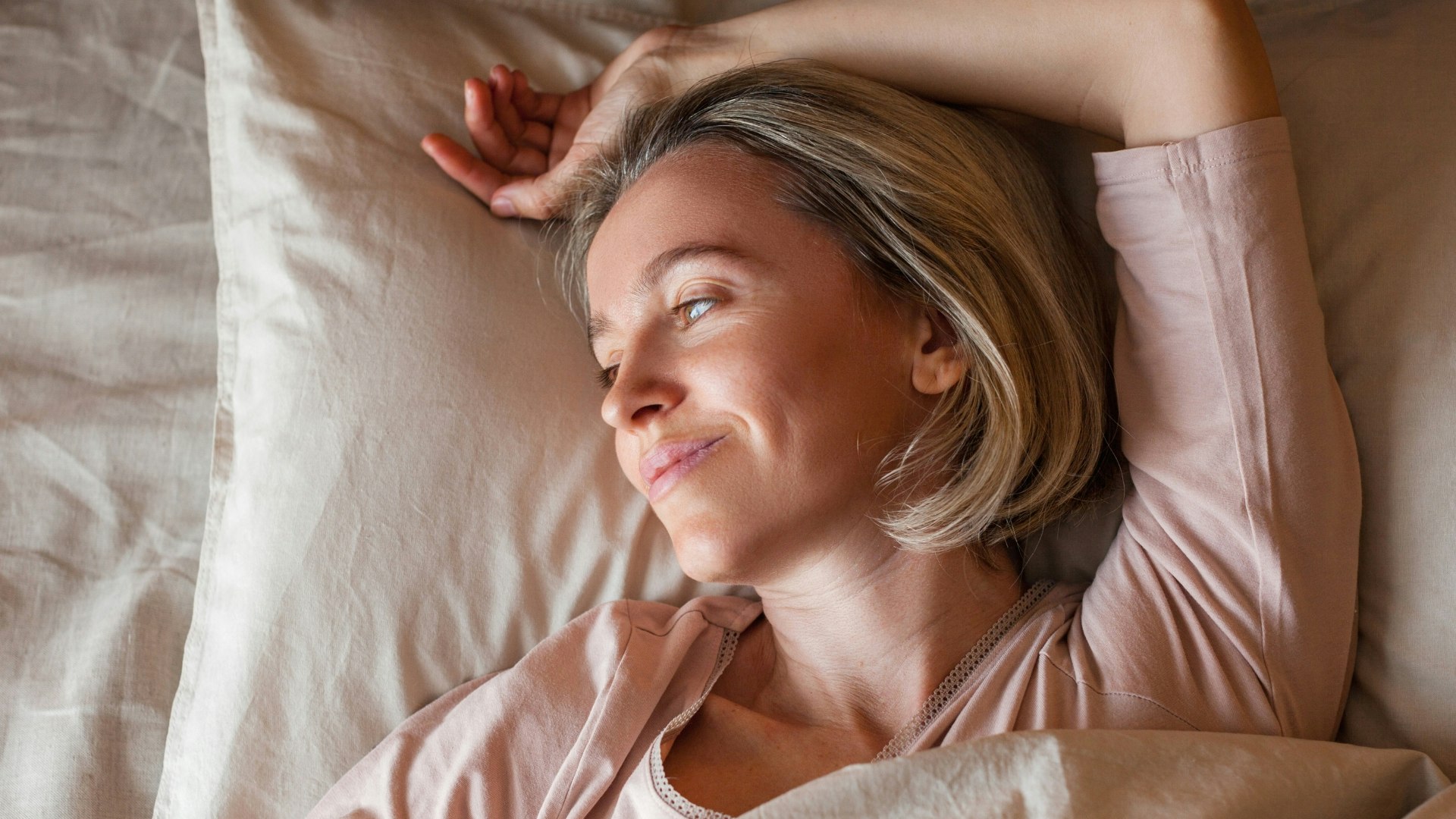 Woman laying down in bed