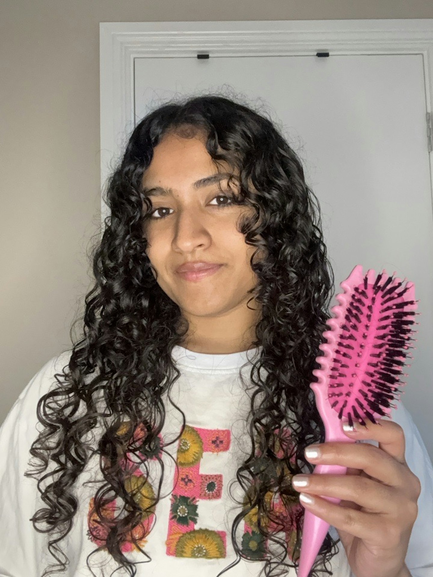 Tester with the Bounce Curl Define EdgeLift Brush