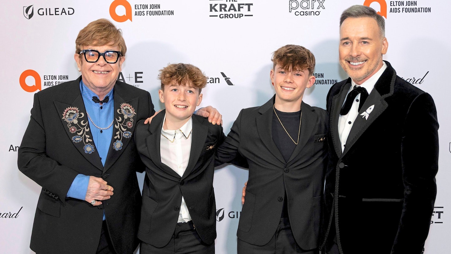 Elton John, left, David Furnish, right and their sons Zachary and Elijah arrive at the 33rd Annual Elton John AIDS Foundation Academy Awards Viewing Party