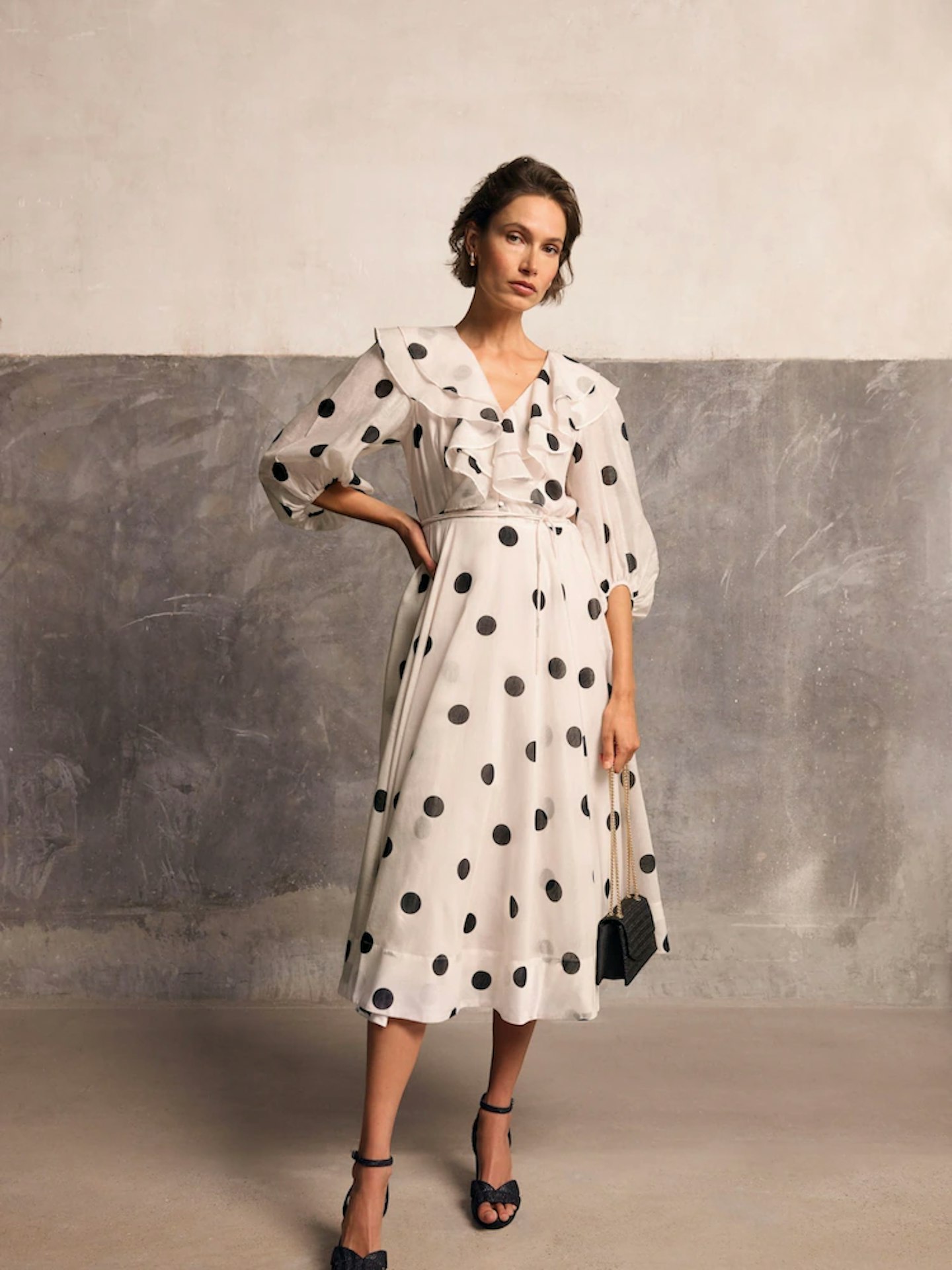 Model wearing the Phase Eight Cream Jaqlyn Spot Dress