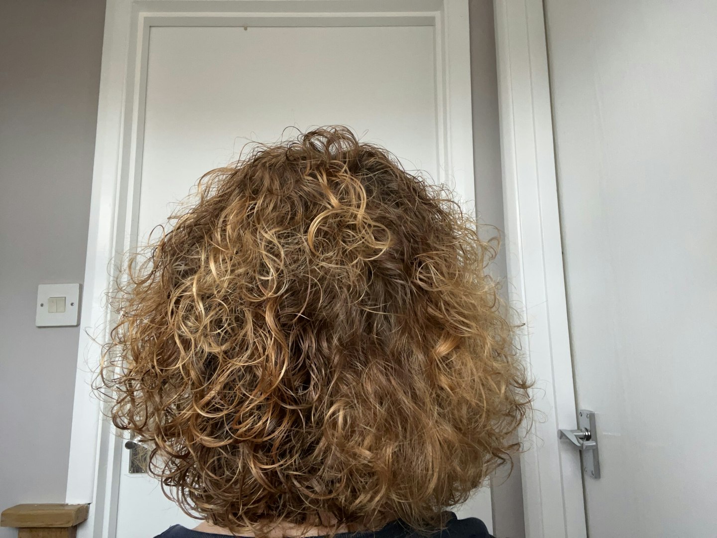 Tester's hair after using the Curl Defining Brush
