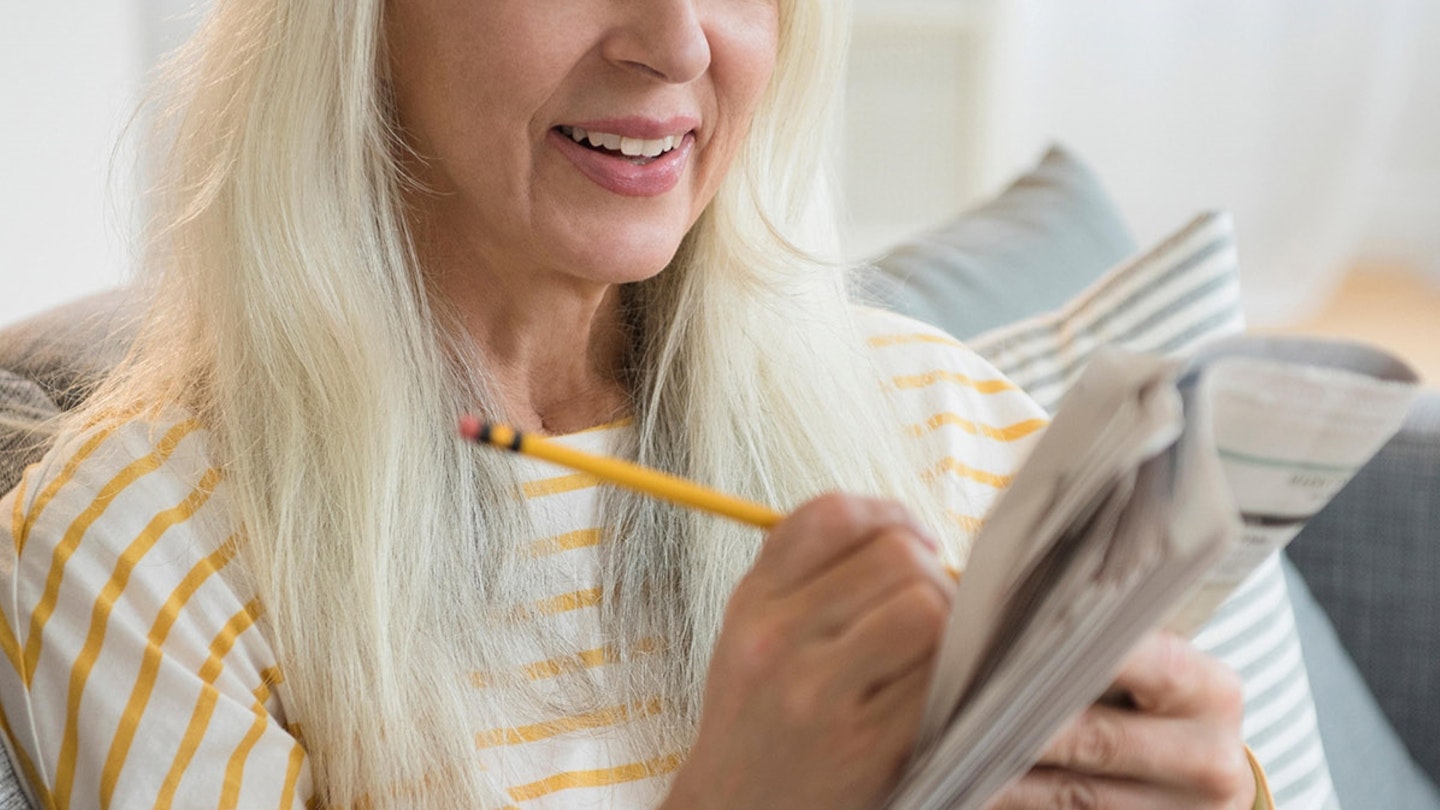 Woman doing puzzle