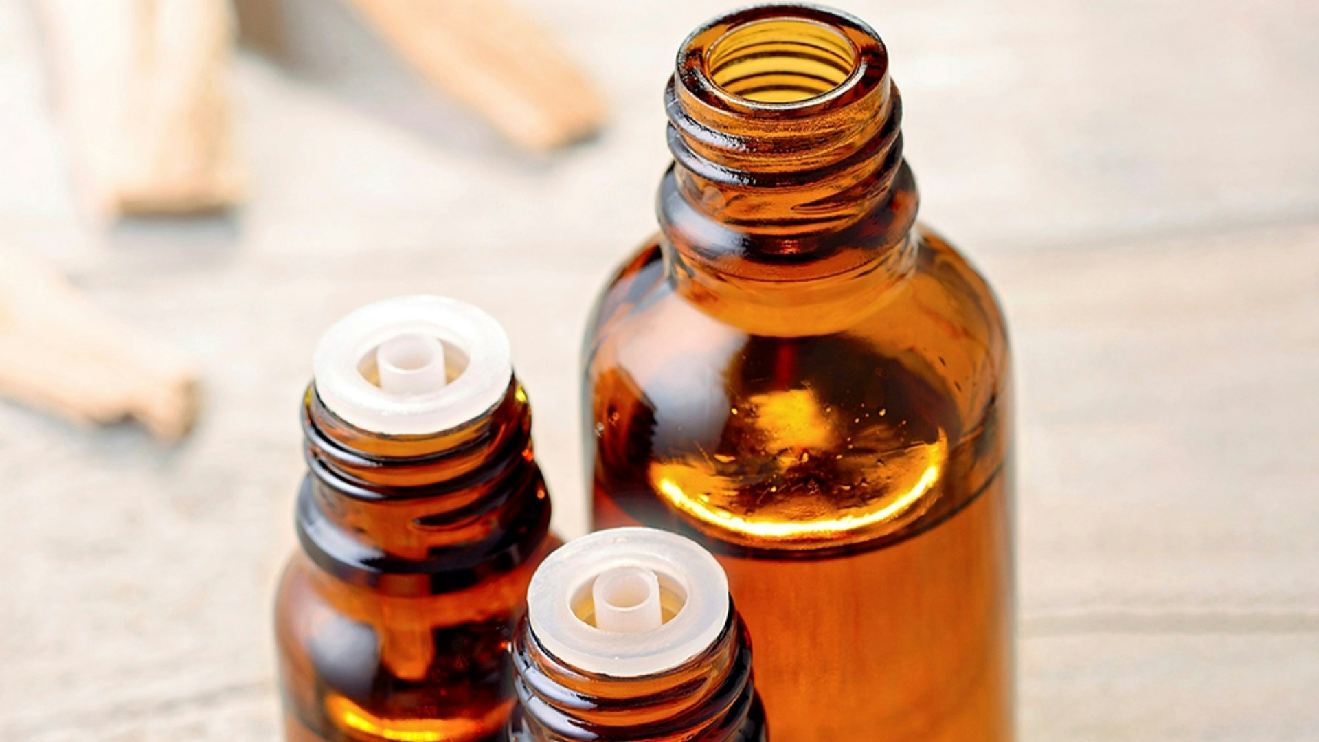 Three bottles of aromatherapy oil
