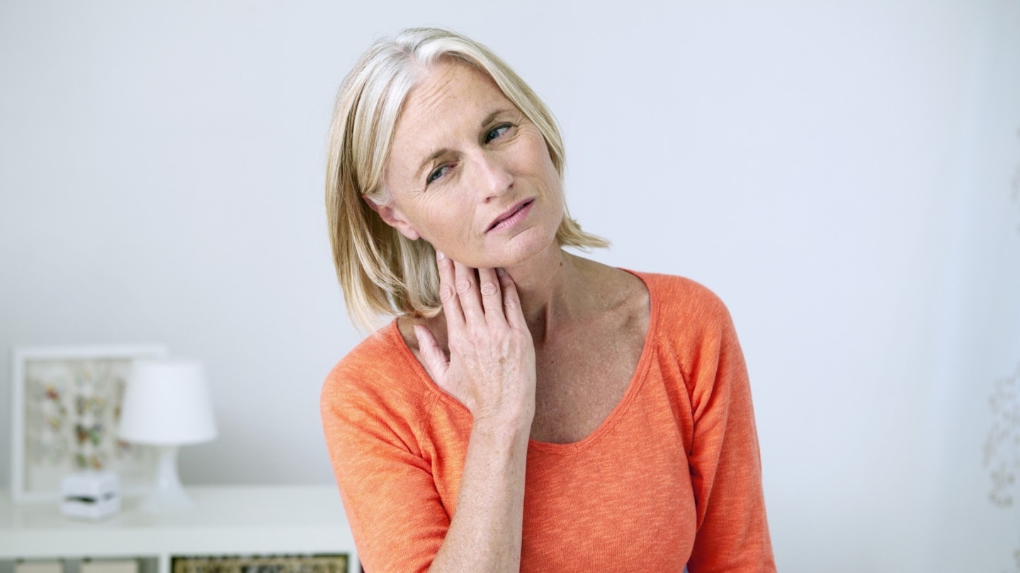 Lady having pain in her neck