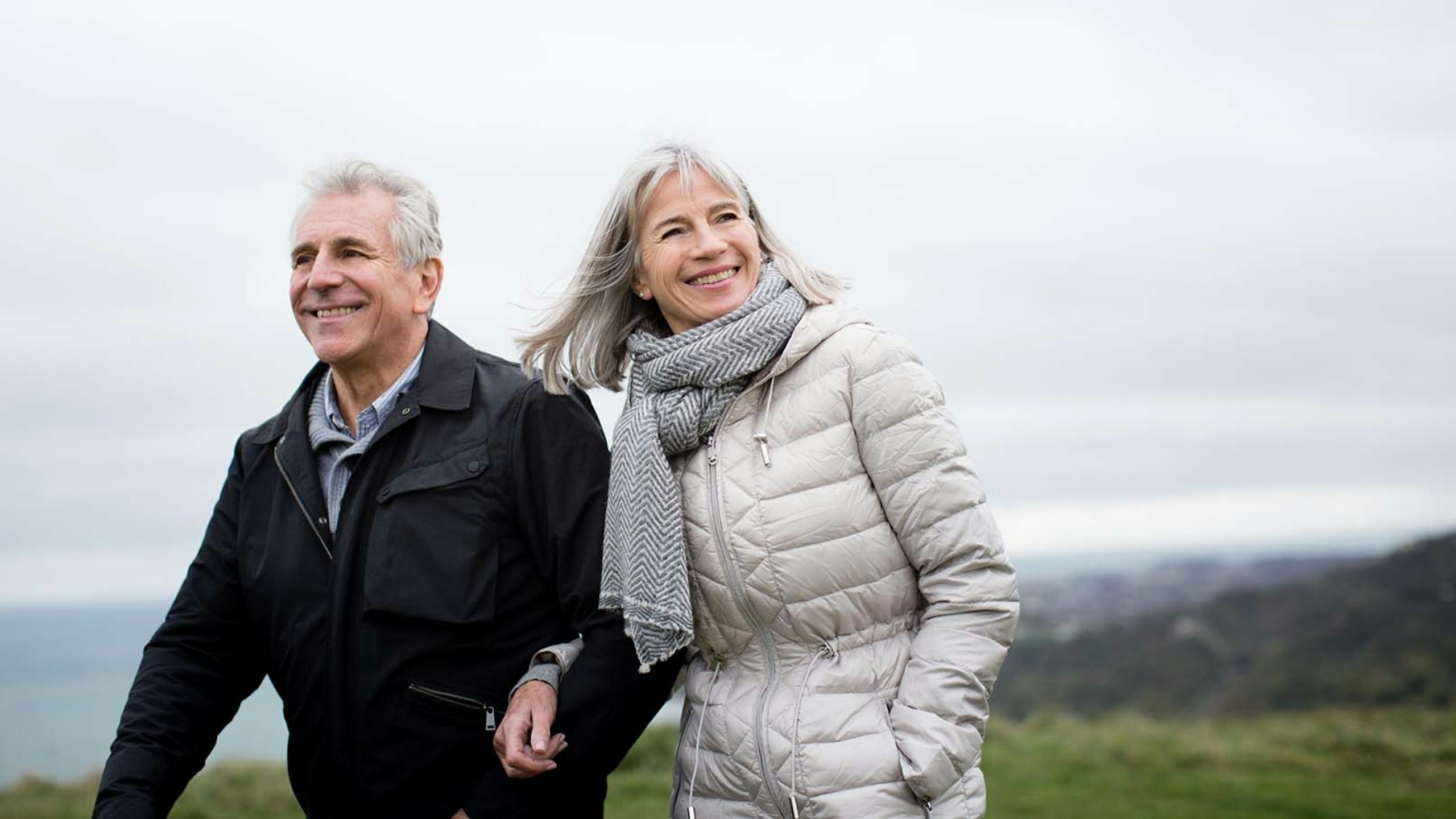 Senior couple walking outdoors
