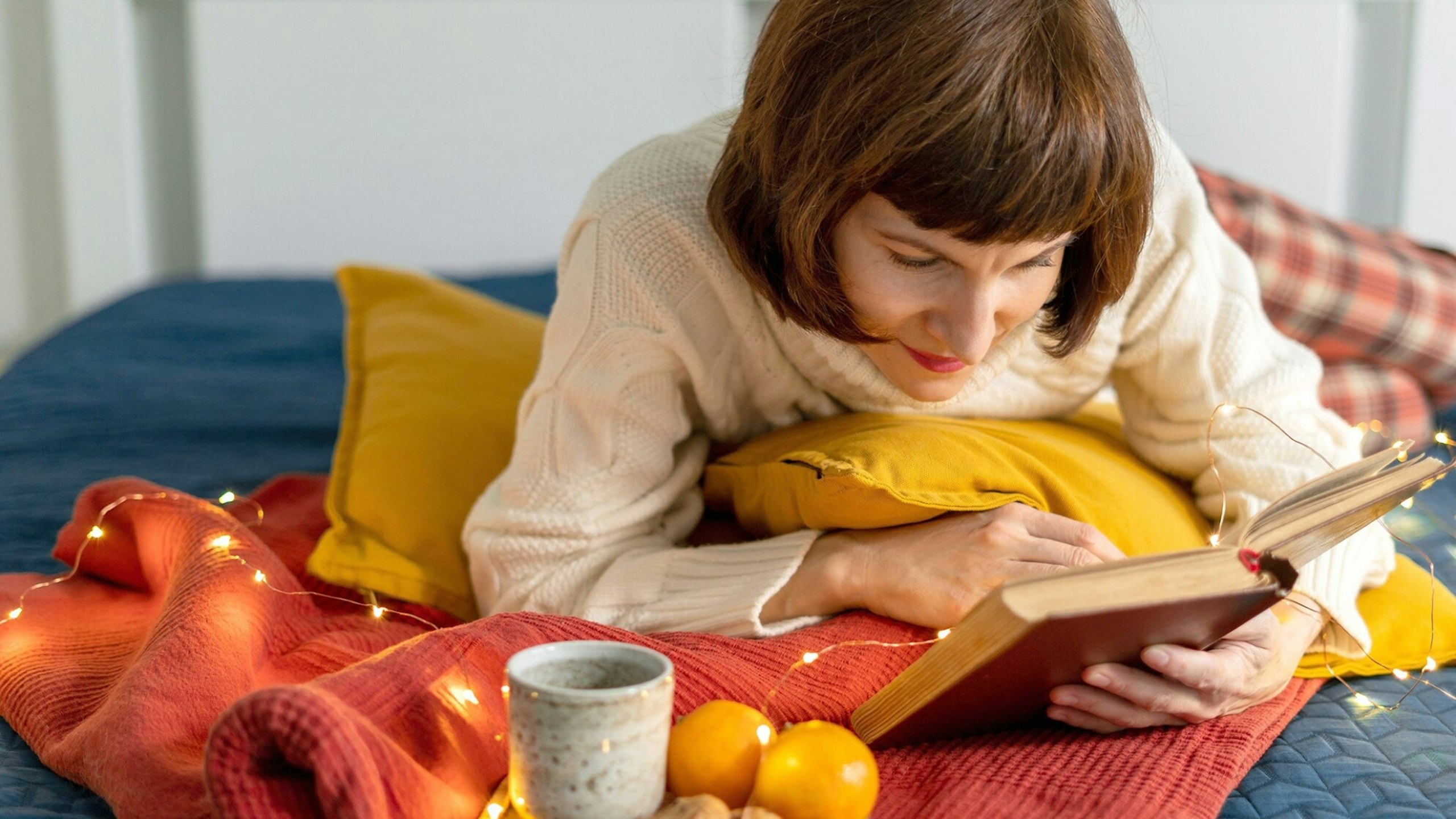 mature woman reading book